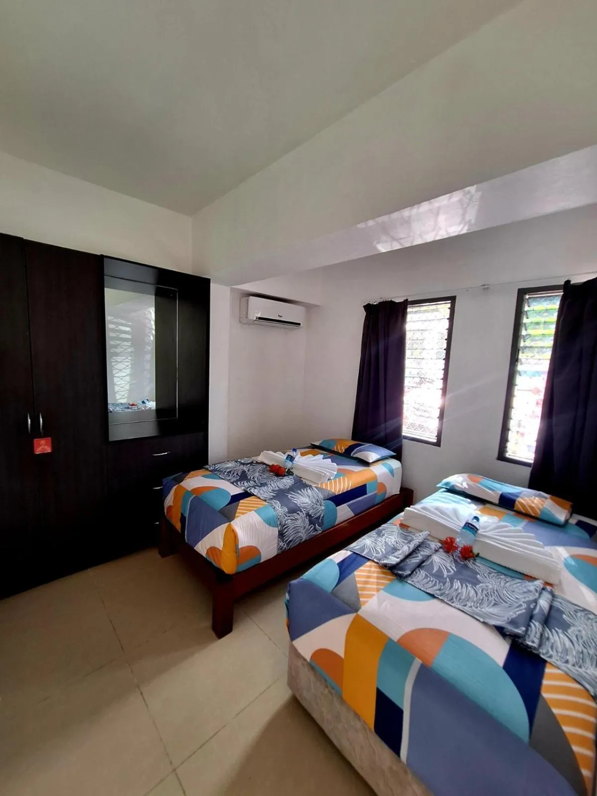Bedroom, Bed in Island Accommodation Suva Premier Hospitality