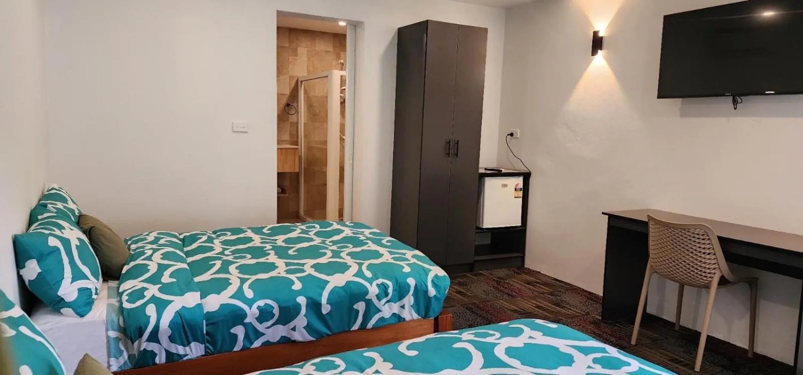 Photo of the whole room, Bed in Island Accommodation Suva Premier Hospitality