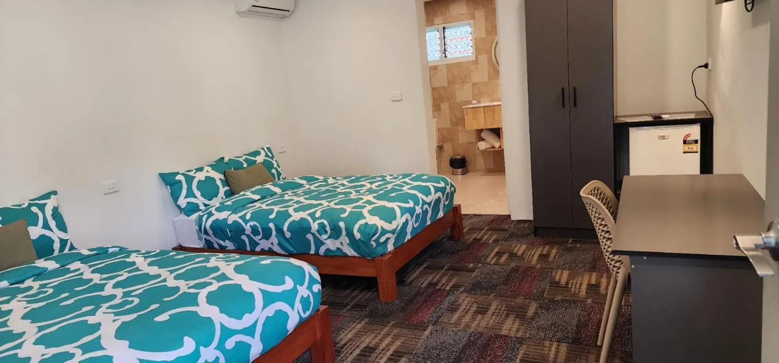 Photo of the whole room, Bed in Island Accommodation Suva Premier Hospitality