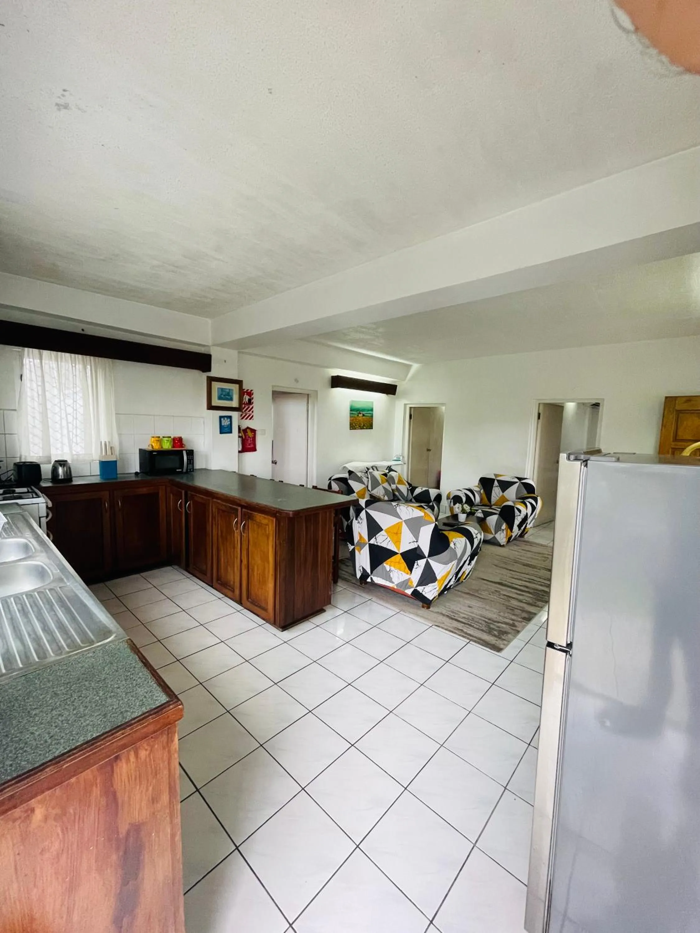 Kitchen or kitchenette in Island Accommodation Suva Premier Hospitality