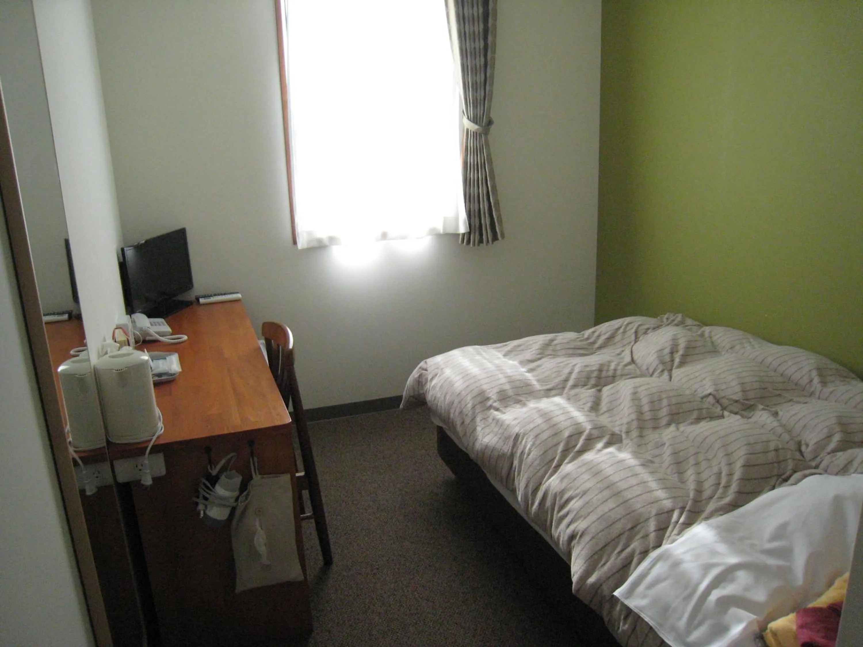 Bed in Kumagaya Royal Hotel Suzuki