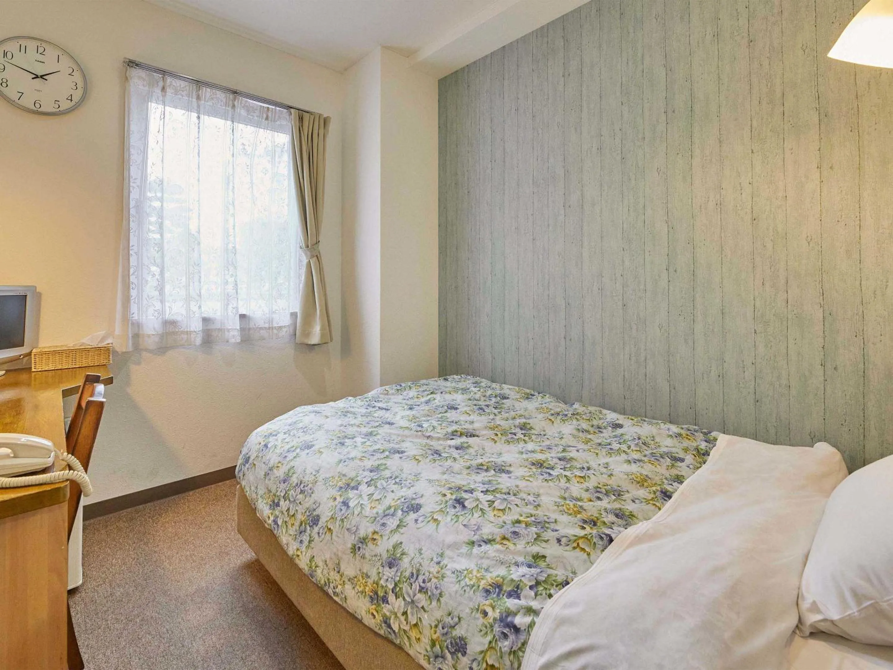 Bed in Kumagaya Royal Hotel Suzuki