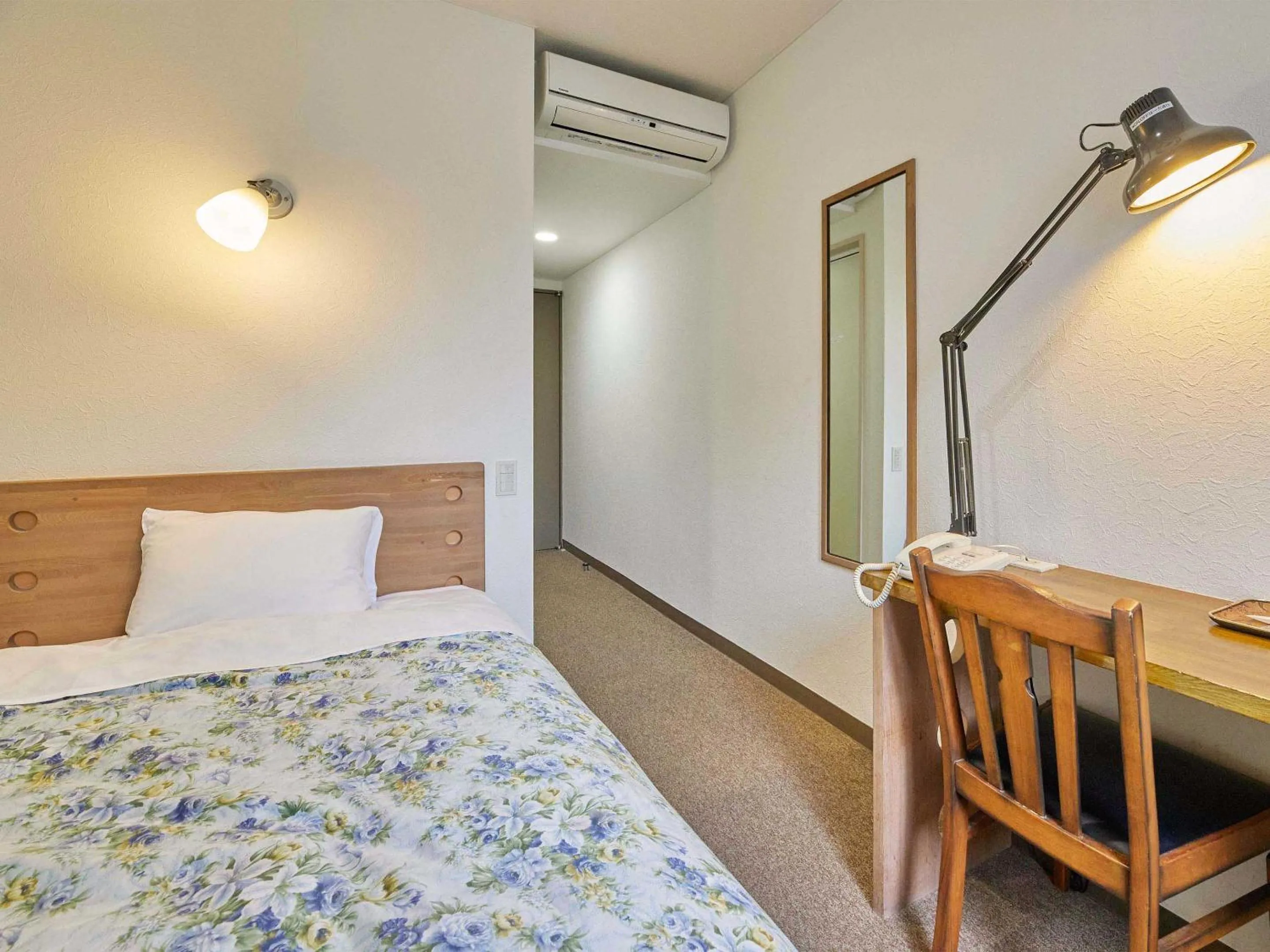 Bed in Kumagaya Royal Hotel Suzuki