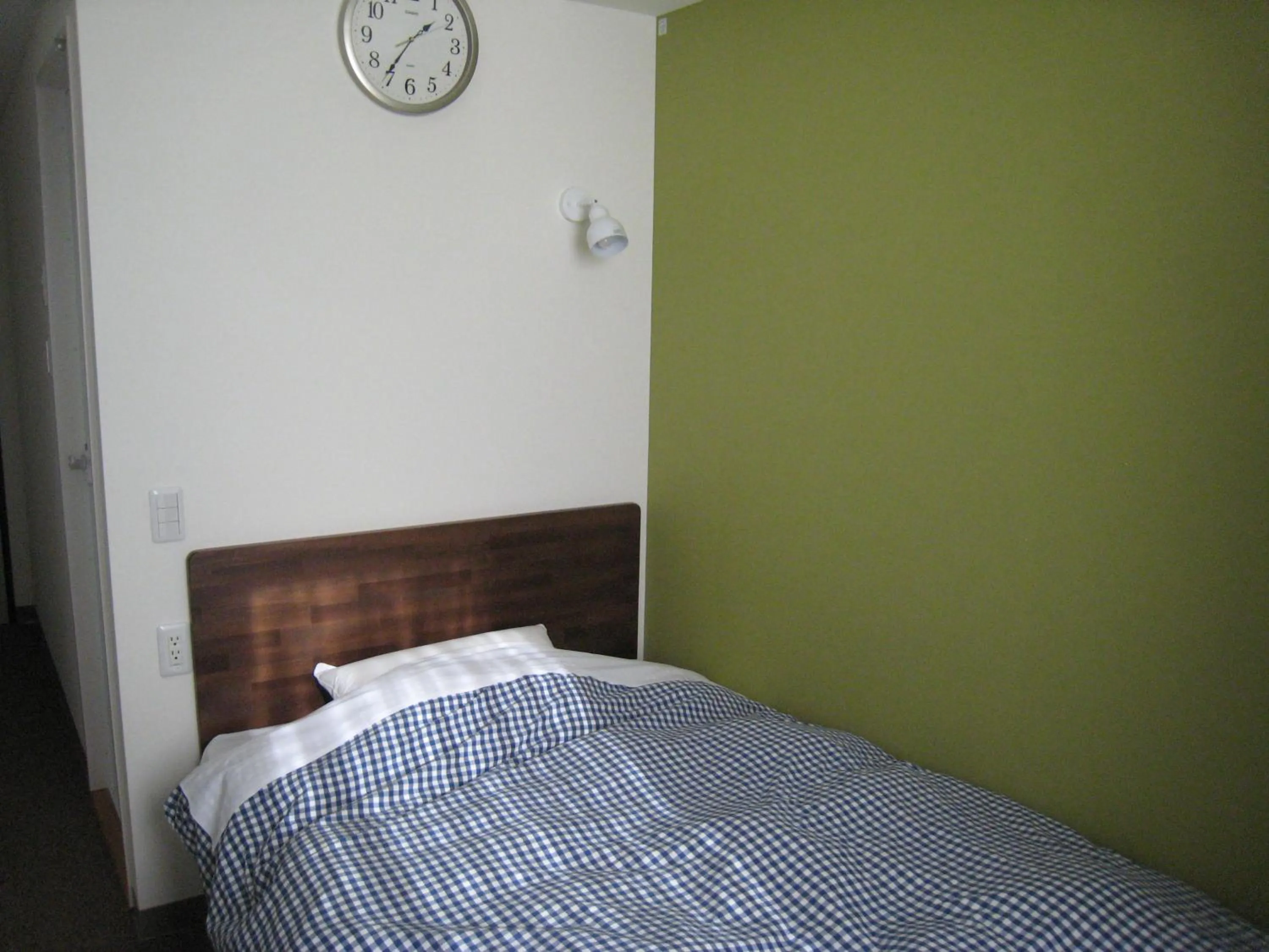 Bed in Kumagaya Royal Hotel Suzuki