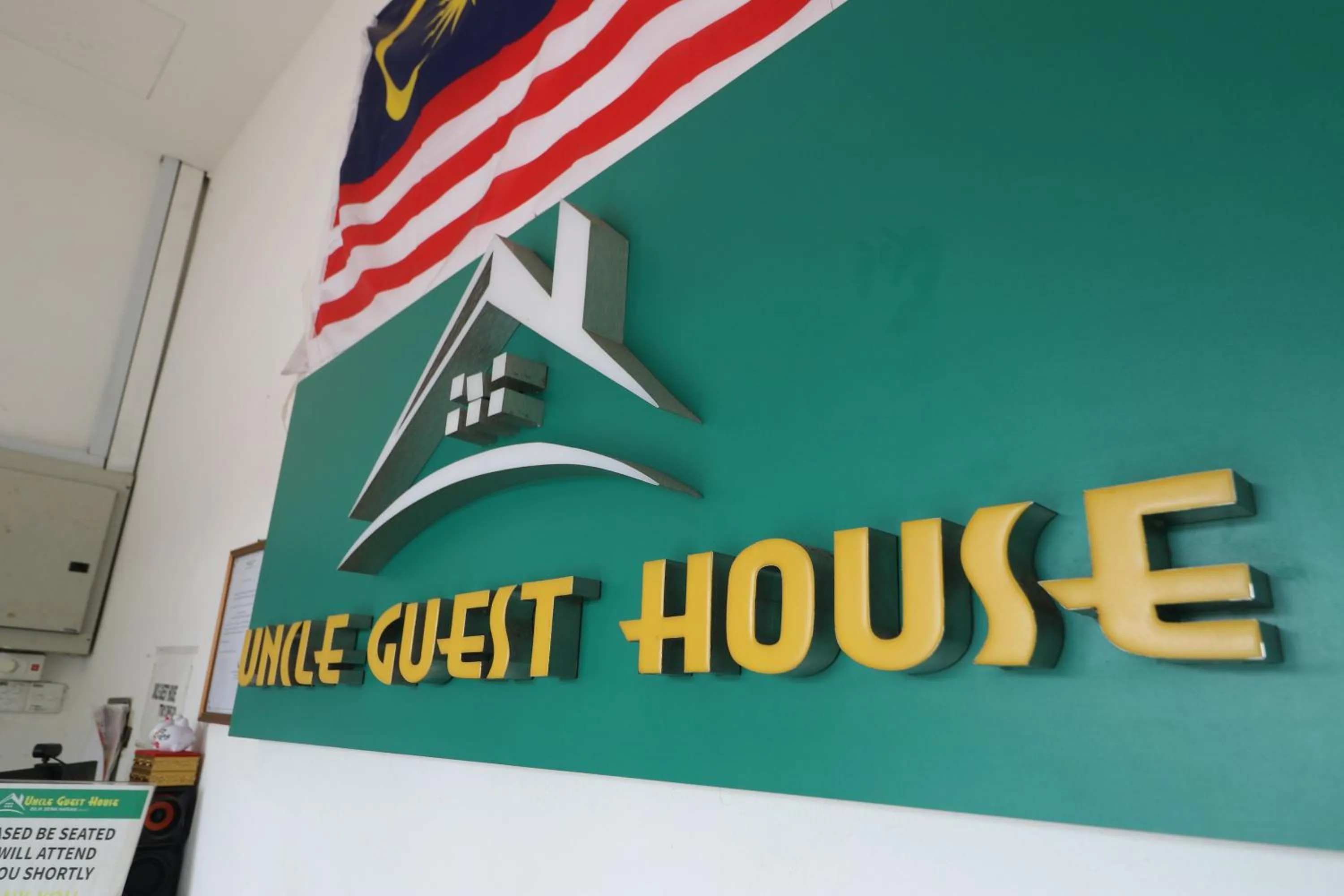Property logo or sign in Uncle Guesthouse Kuala Terengganu