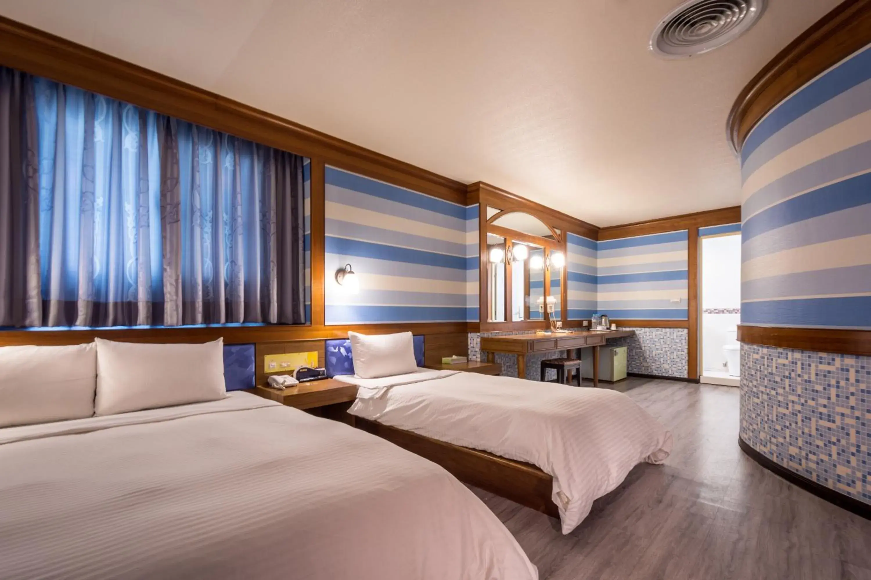 Standard Triple Room in Golden Phoenix Hotel Standard Triple Room in Golden Phoenix Hotel