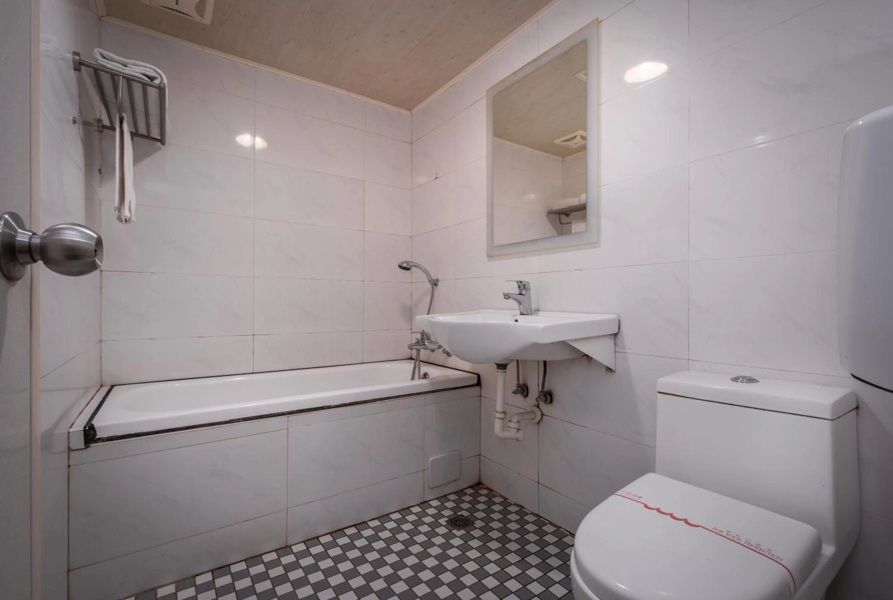 Bathroom in Golden Phoenix Hotel