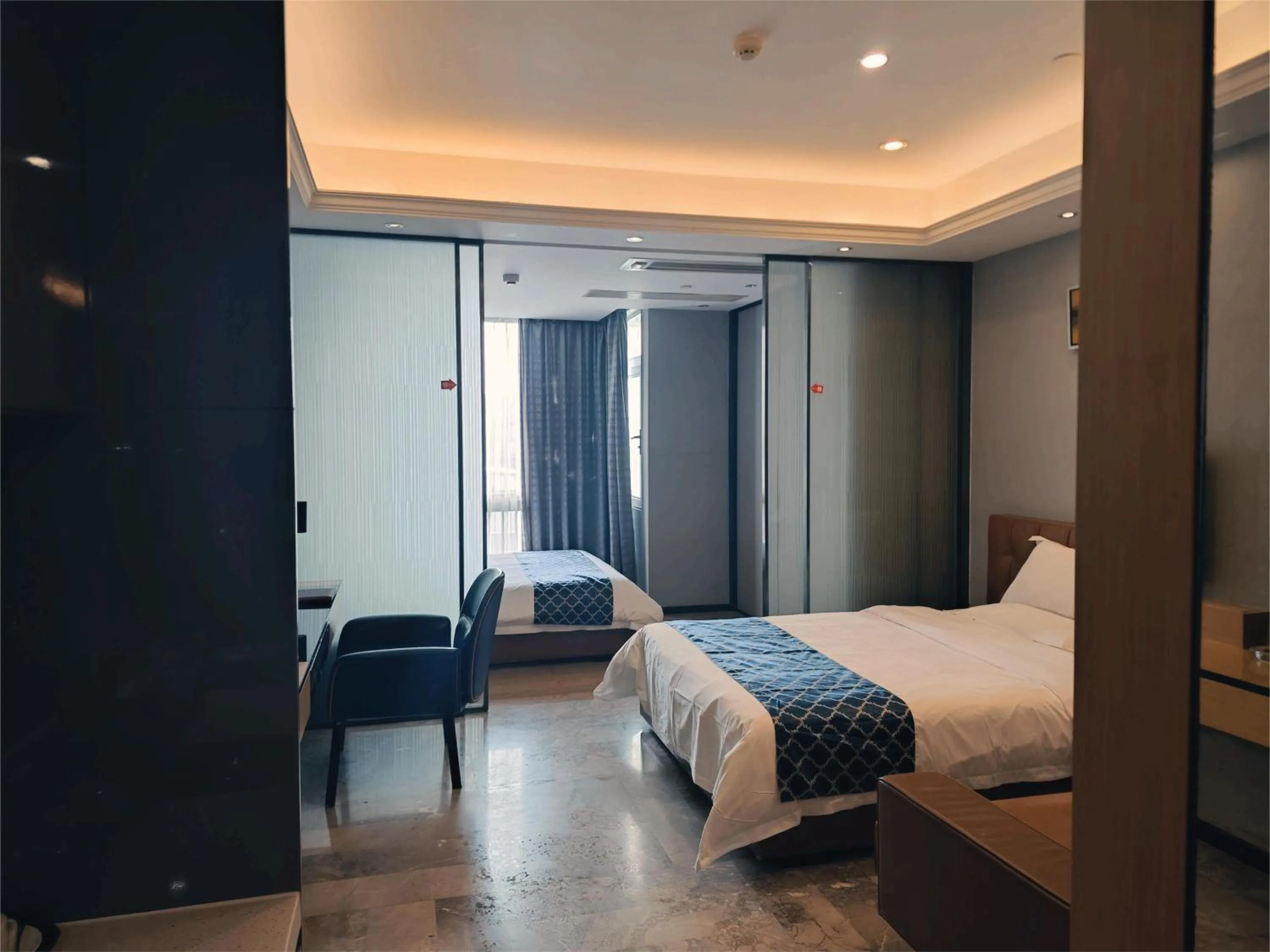 Photo of the whole room, Bed in Green Lemon Tree International Apartment - Beijing Road Jiedeng Metropolis Branch