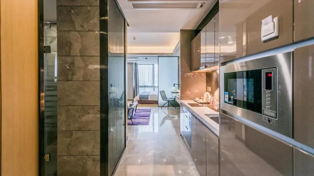 Photo of the whole room, Bed in Green Lemon Tree International Apartment - Beijing Road Jiedeng Metropolis Branch