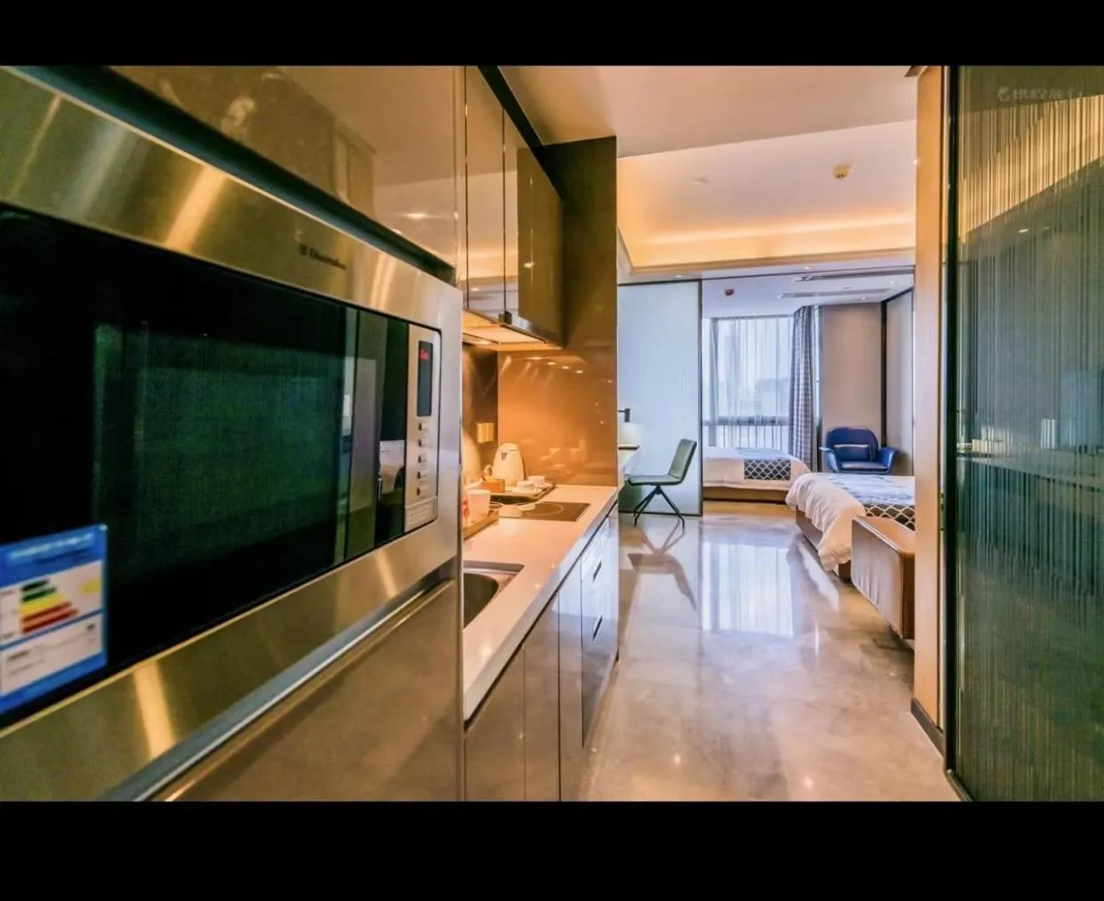 Kitchen or kitchenette in Green Lemon Tree International Apartment - Beijing Road Jiedeng Metropolis Branch