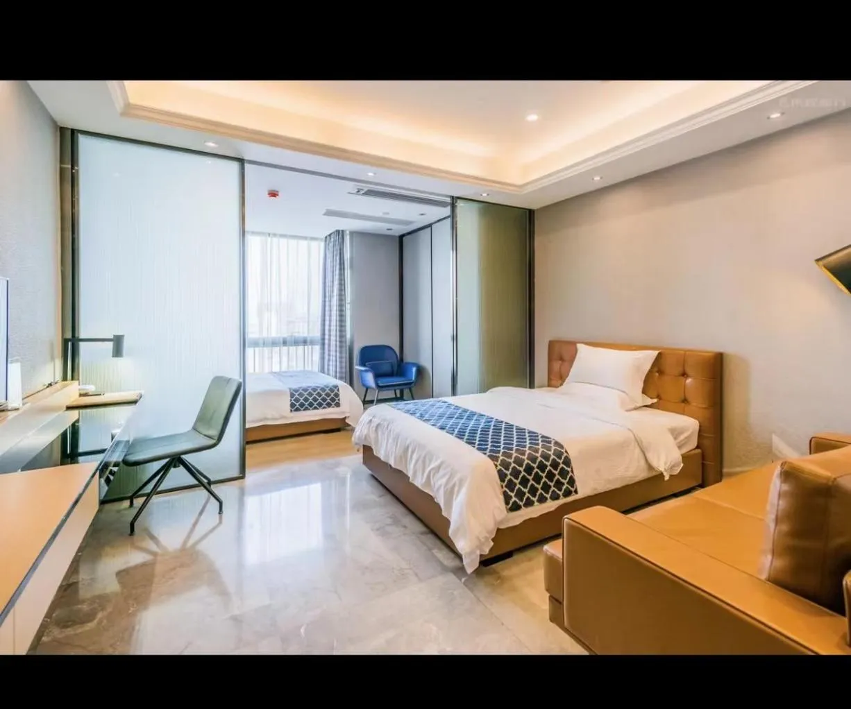 Photo of the whole room, Bed in Green Lemon Tree International Apartment - Beijing Road Jiedeng Metropolis Branch