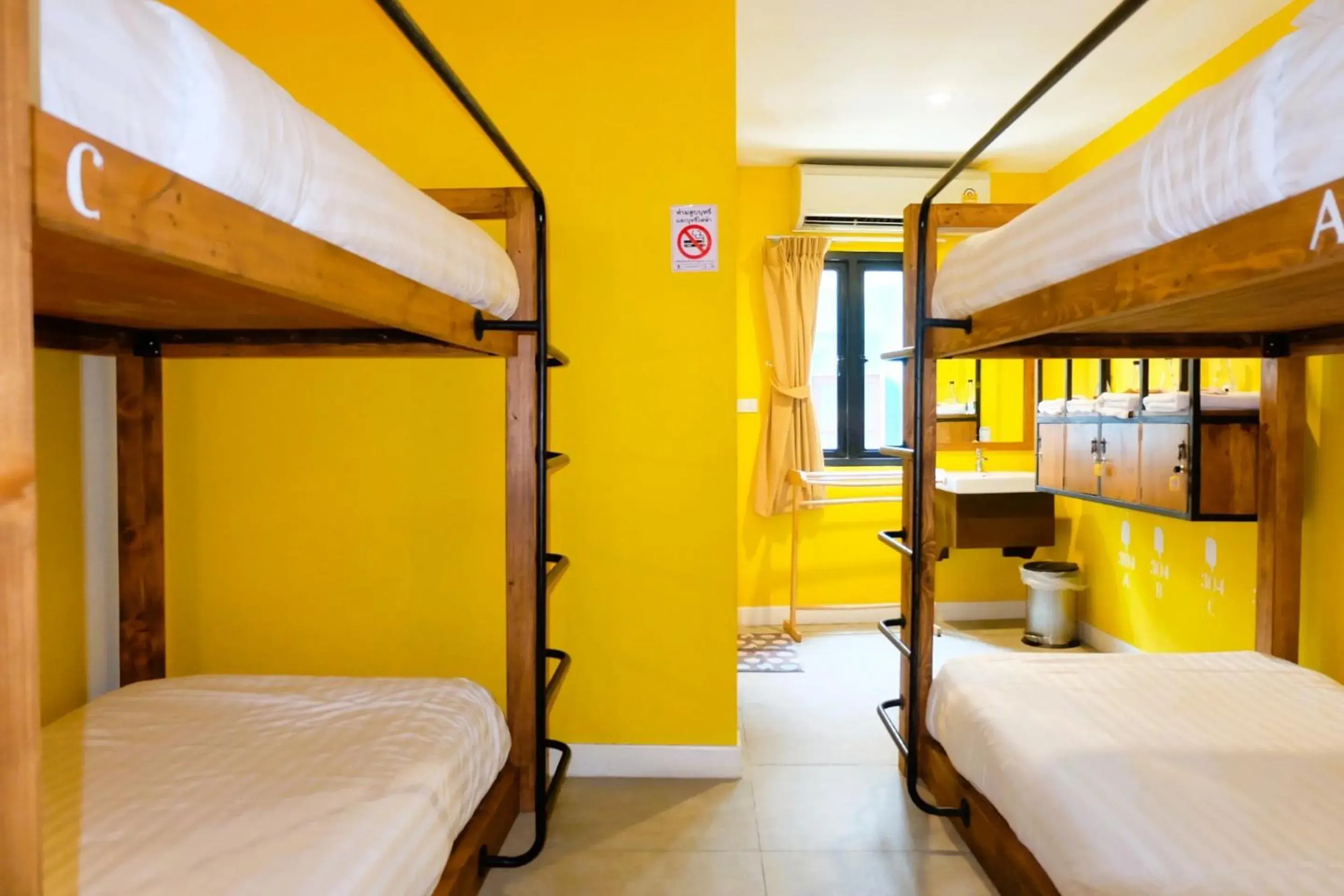 Quadruple Room with Bunk Beds in Siri Poshtel Bangkok Quadruple Room with Bunk Beds in Siri Poshtel Bangkok