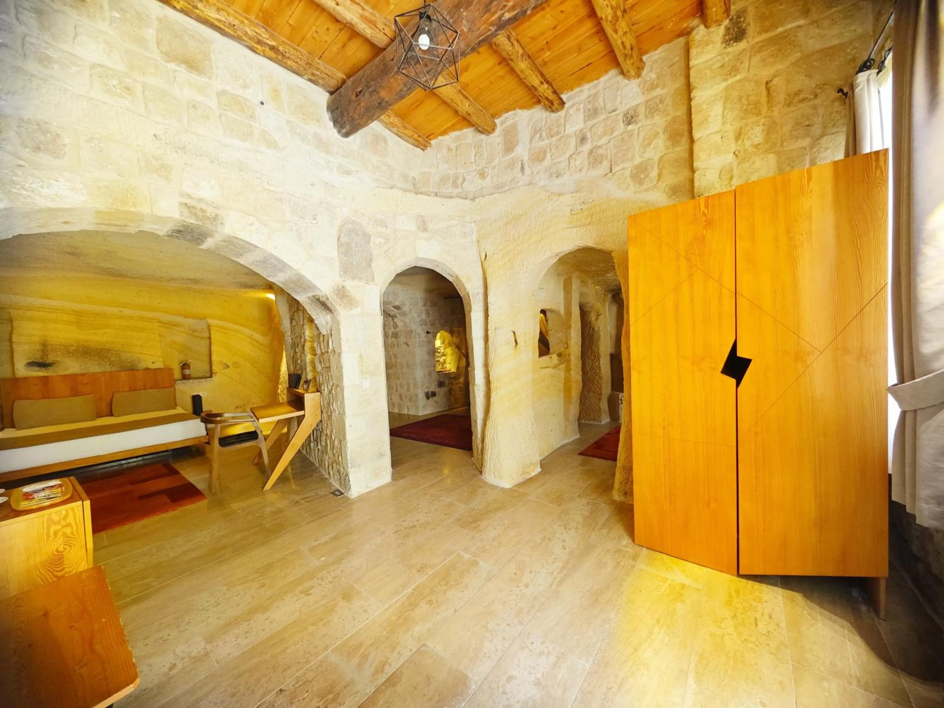 wardrobe, Bed in Acropolis Cave Suite