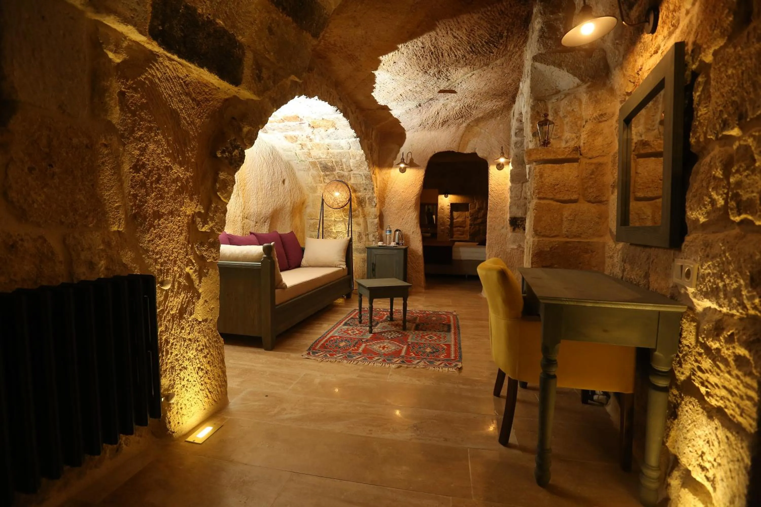 Bed in Acropolis Cave Suite