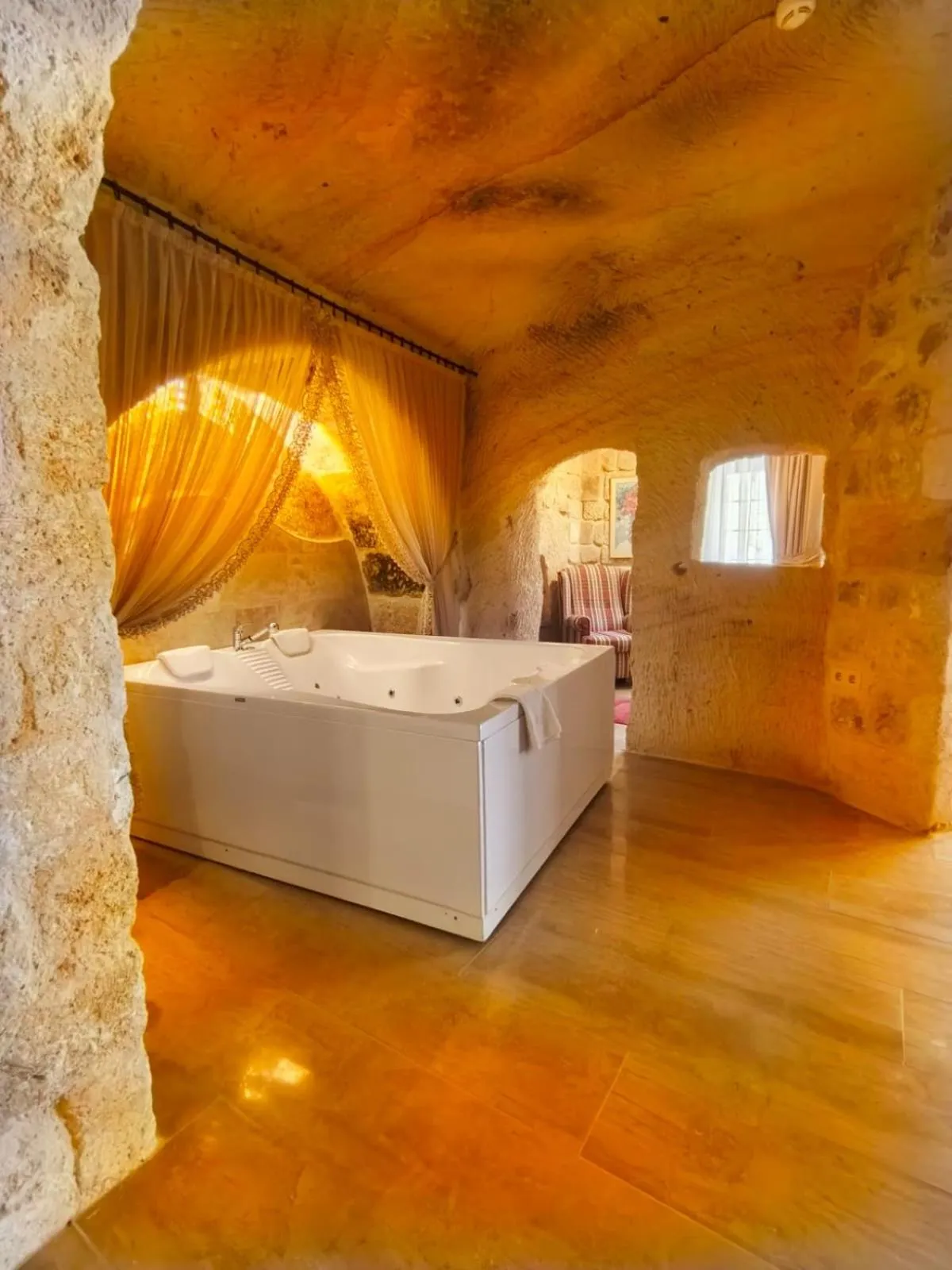 Photo of the whole room, Bed in Acropolis Cave Suite