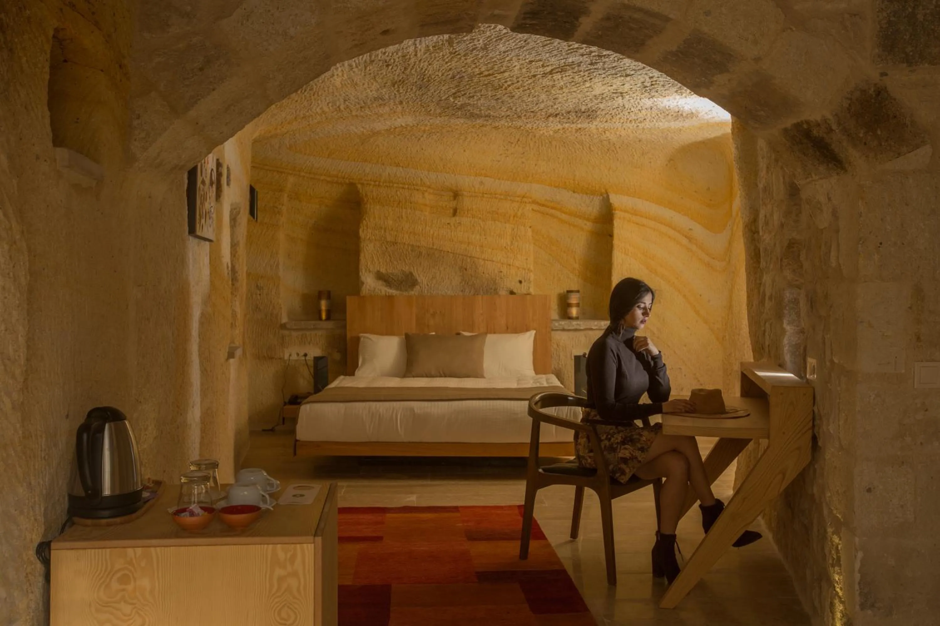Property building, Bed in Acropolis Cave Suite