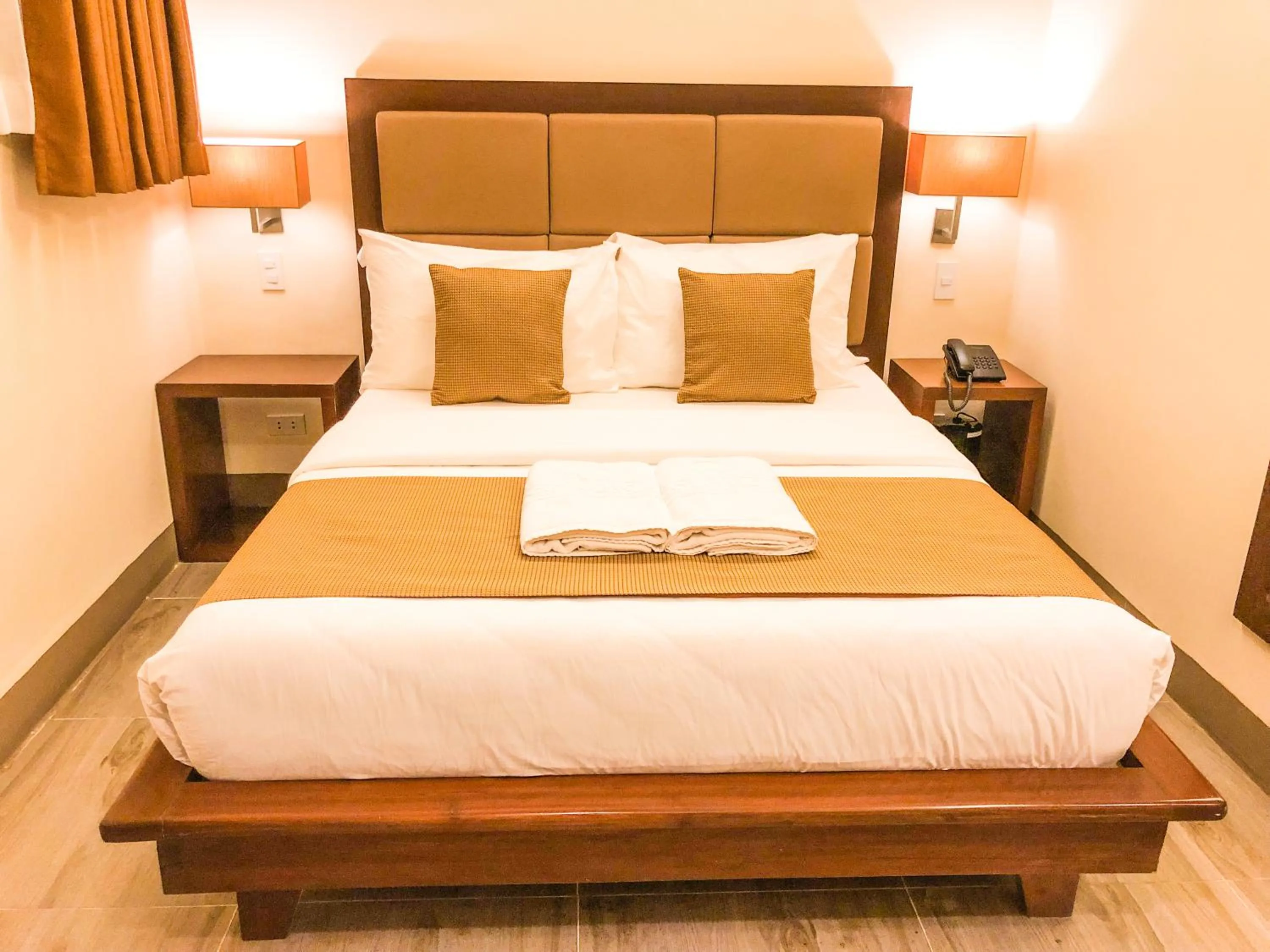 Photo of the whole room, Bed in The Piccolo Hotel of Boracay