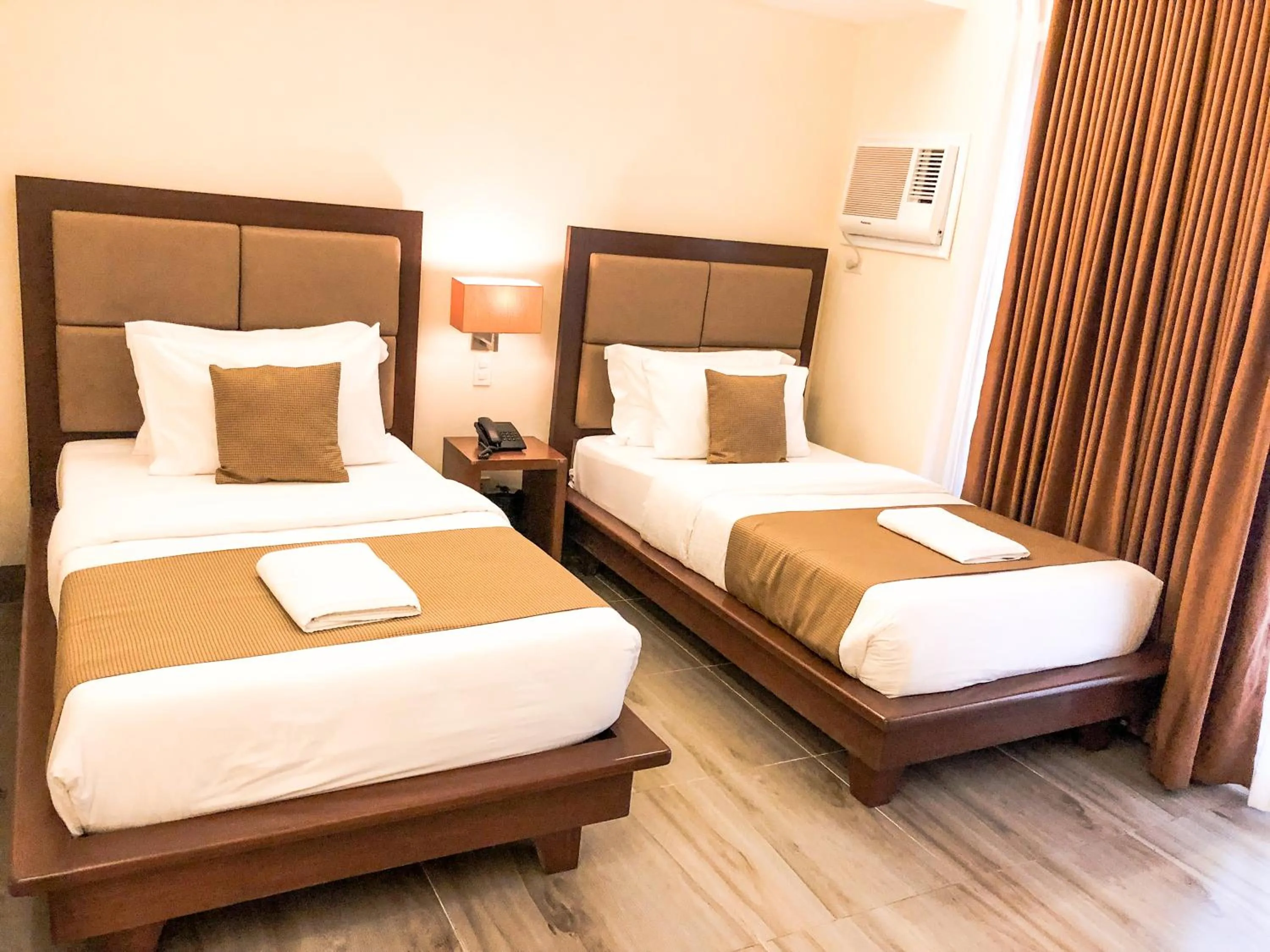 Bed in The Piccolo Hotel of Boracay