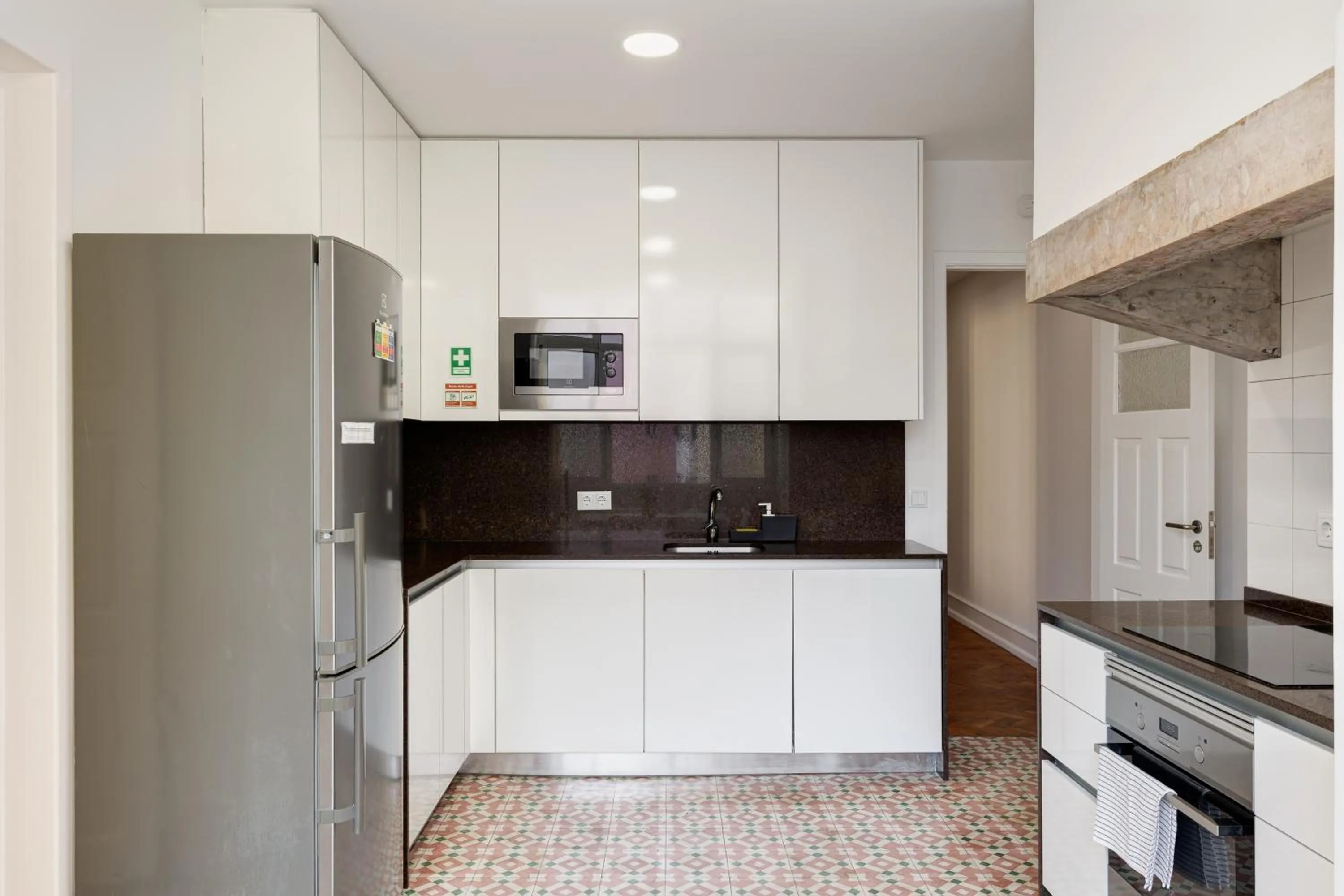 Kitchen or kitchenette in Home Out Rooms & Apartments