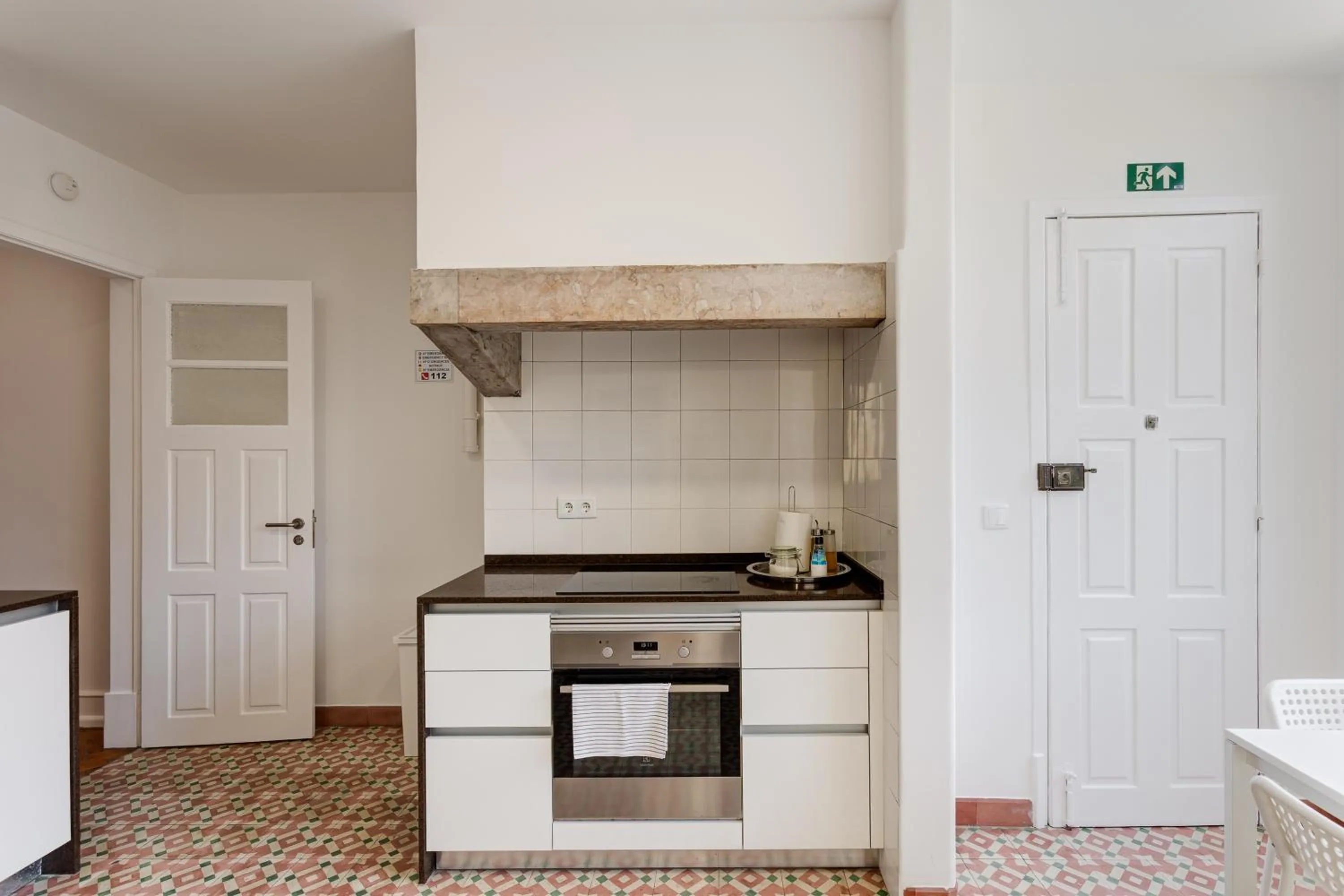 Kitchen or kitchenette in Home Out Rooms & Apartments