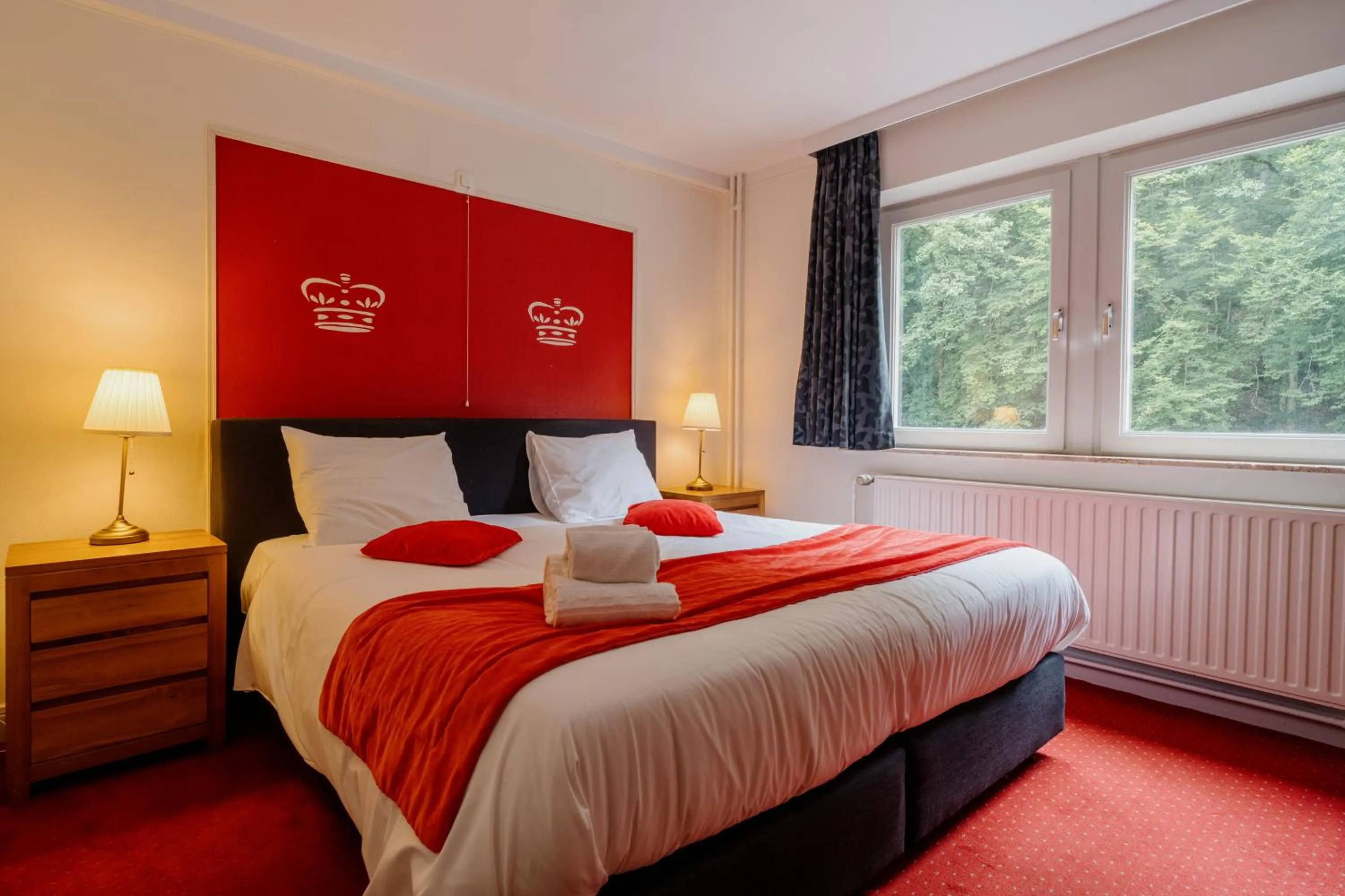 Bed in Hotel L'eau Vive