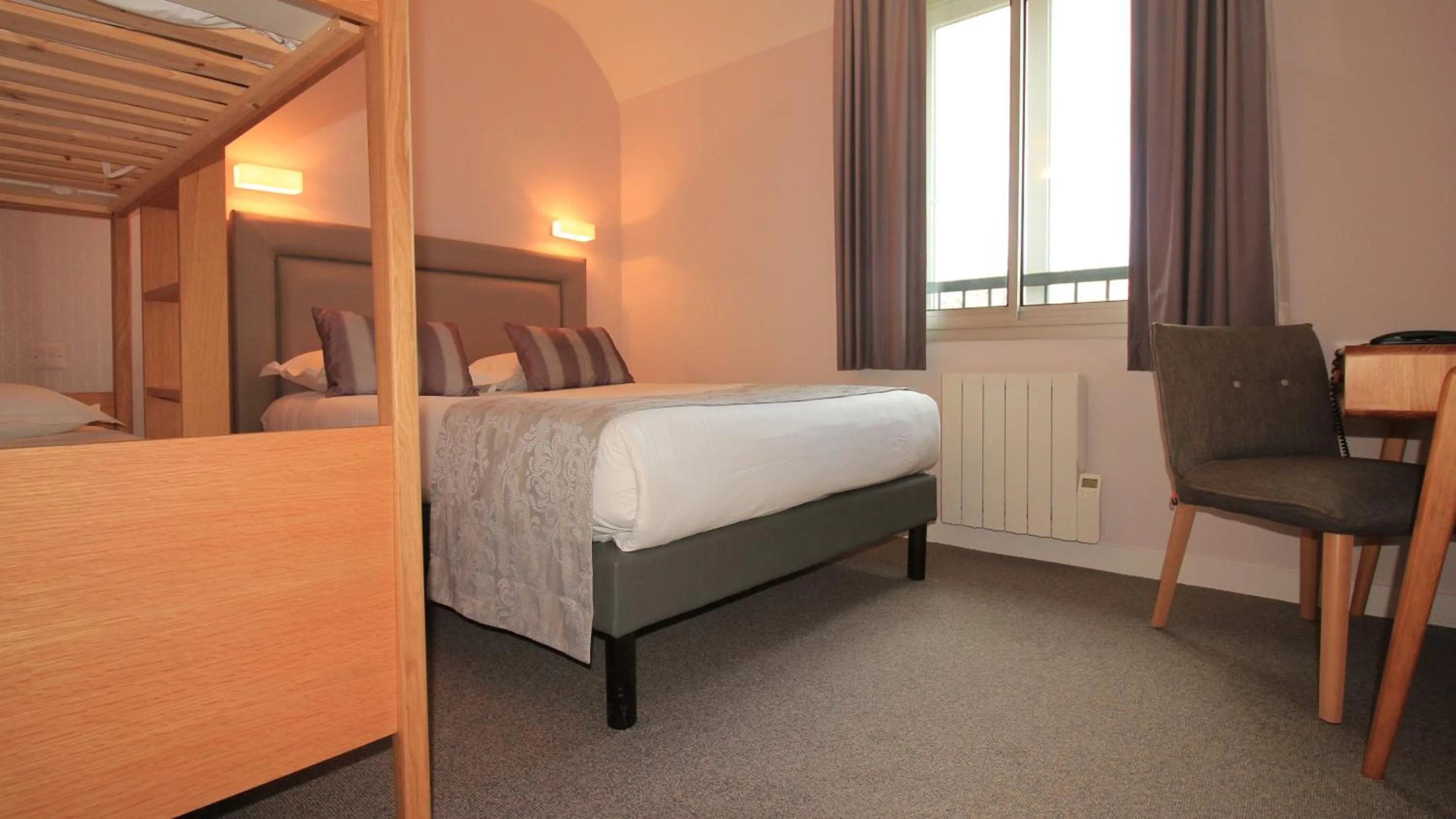 Bedroom, Bed in Logis Hôtel Lodge La Valette