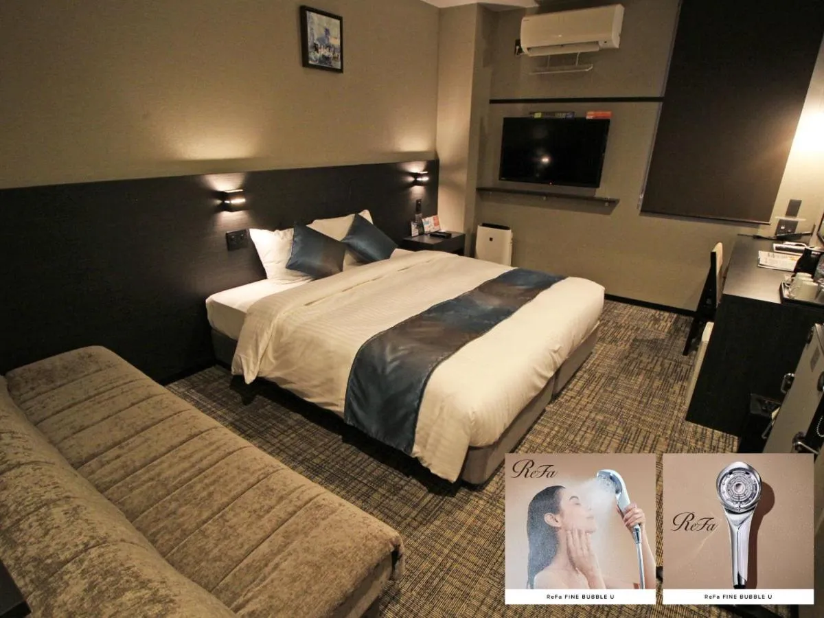 Bed in Astil Hotel Shinosaka Precious