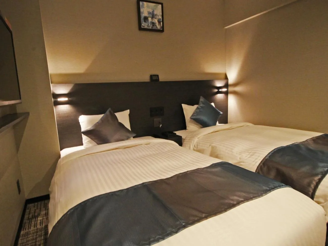 Bed in Astil Hotel Shinosaka Precious