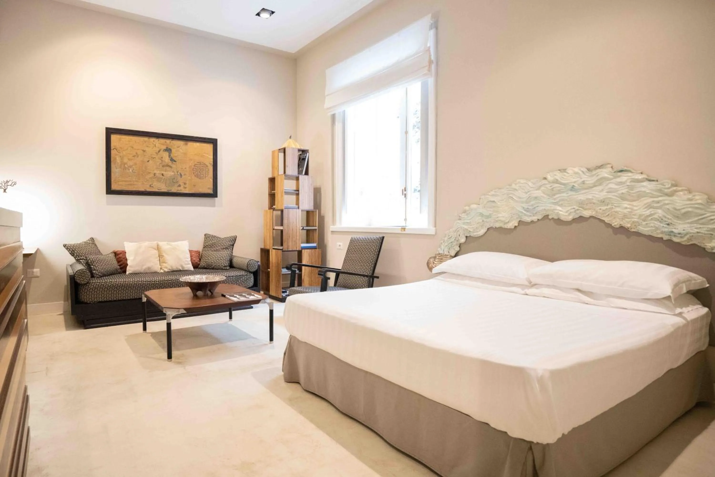 Bed in Atelier Inès Arts & Suites