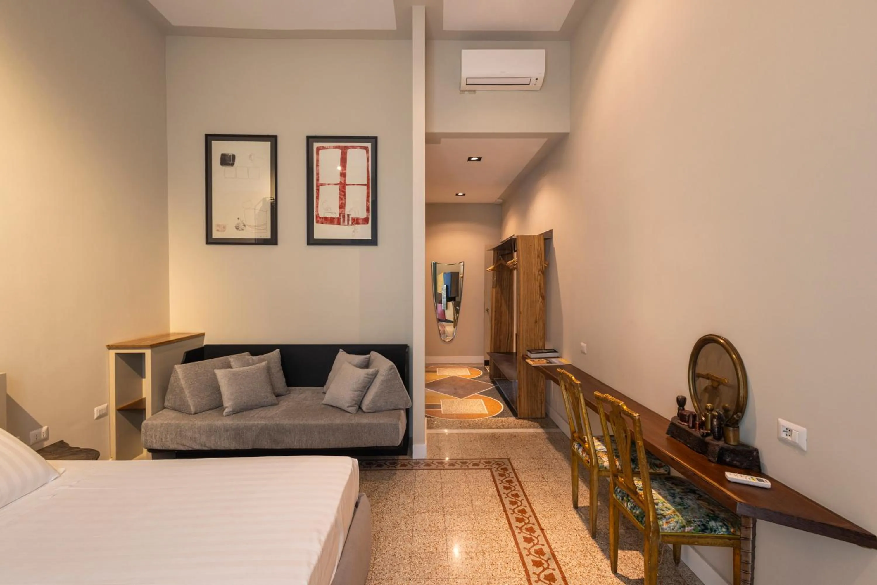 Bed in Atelier Inès Arts & Suites