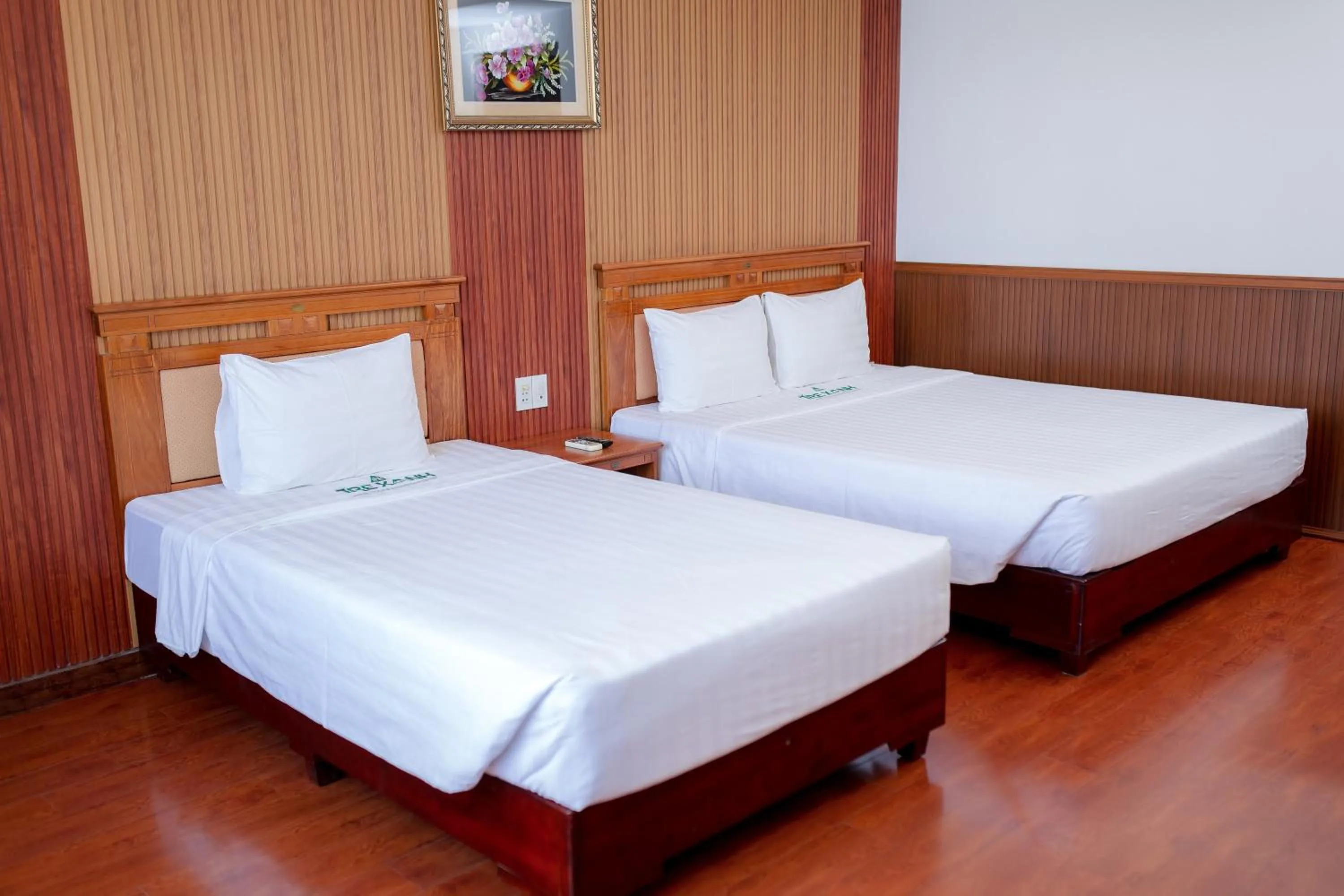 Bed in Tre Xanh Hotel