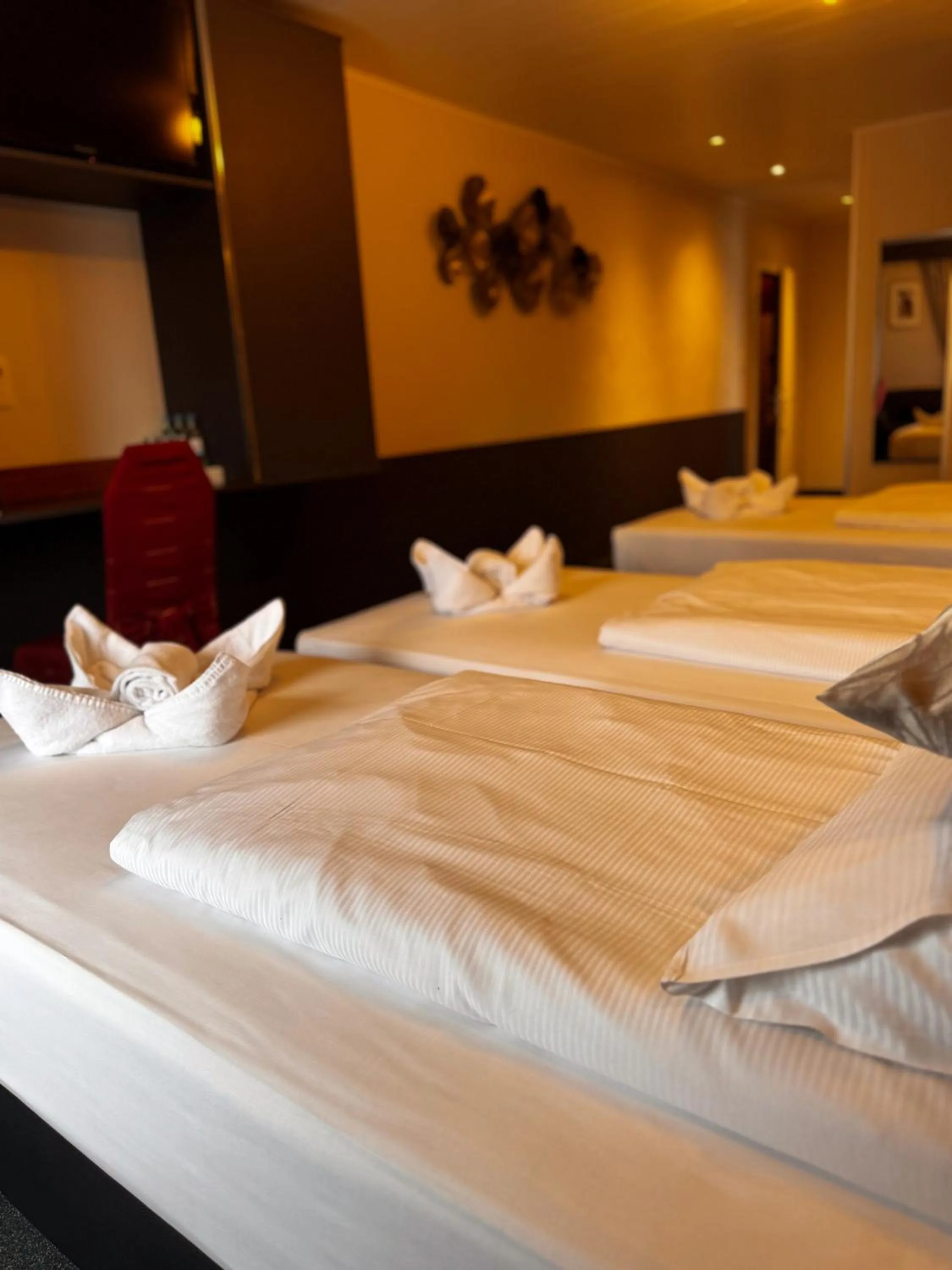 Bed in RAVeL Hotel Cyrano