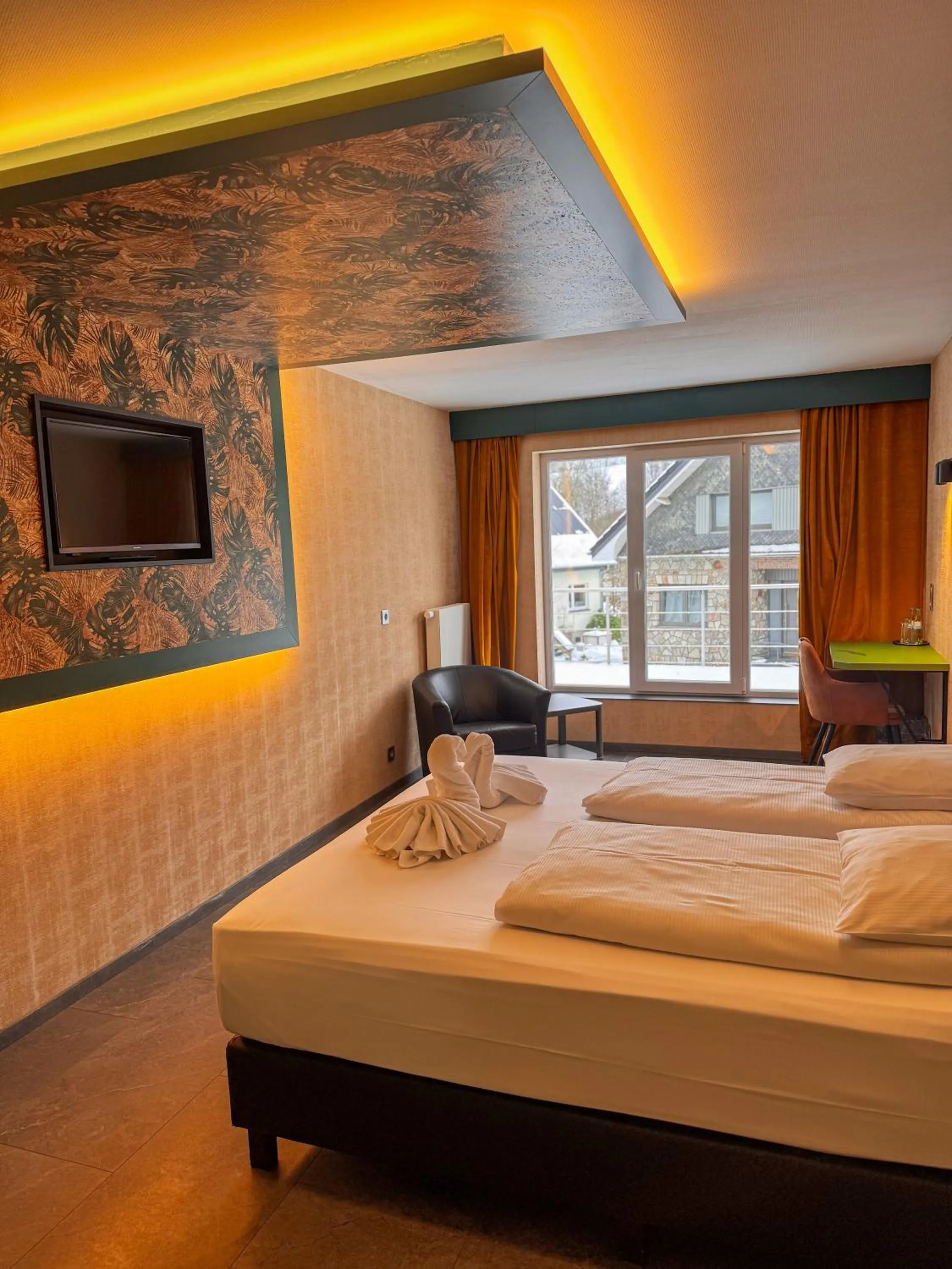 TV and multimedia, Bed in RAVeL Hotel Cyrano