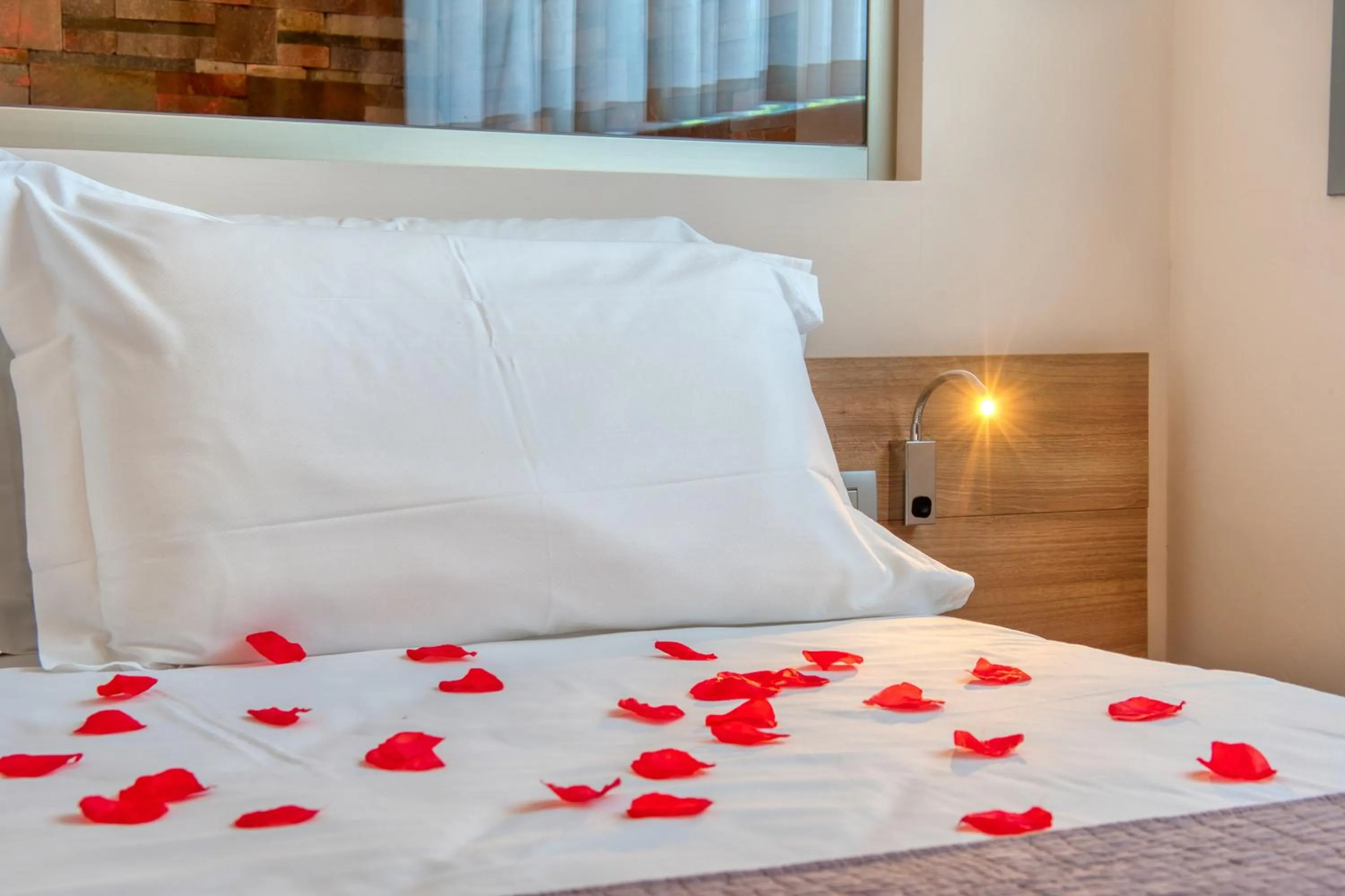 Bed in Boutique Hotel Bramante & SPA