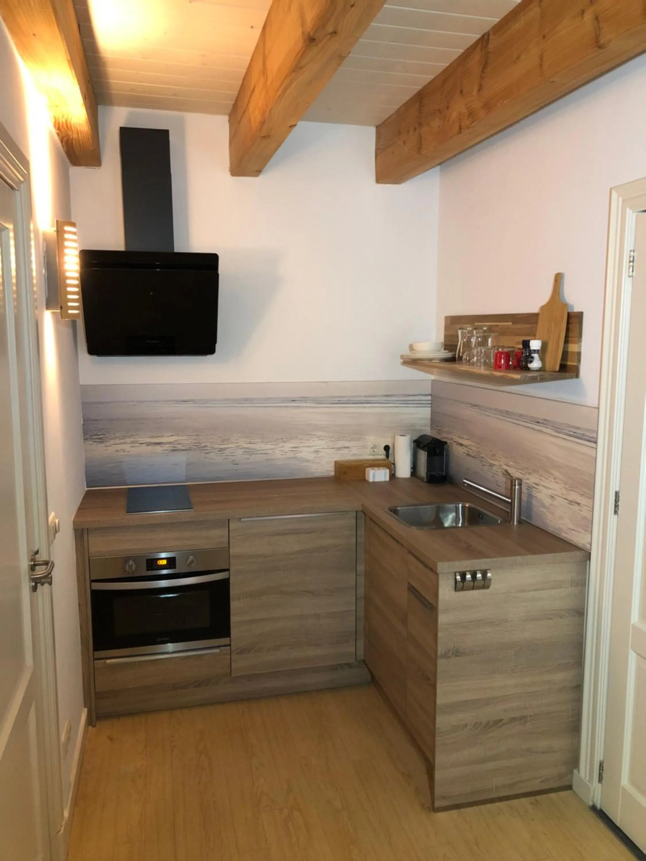Kitchen or kitchenette in B&B Idylle aan Zee incl 2 Wellnessstudios