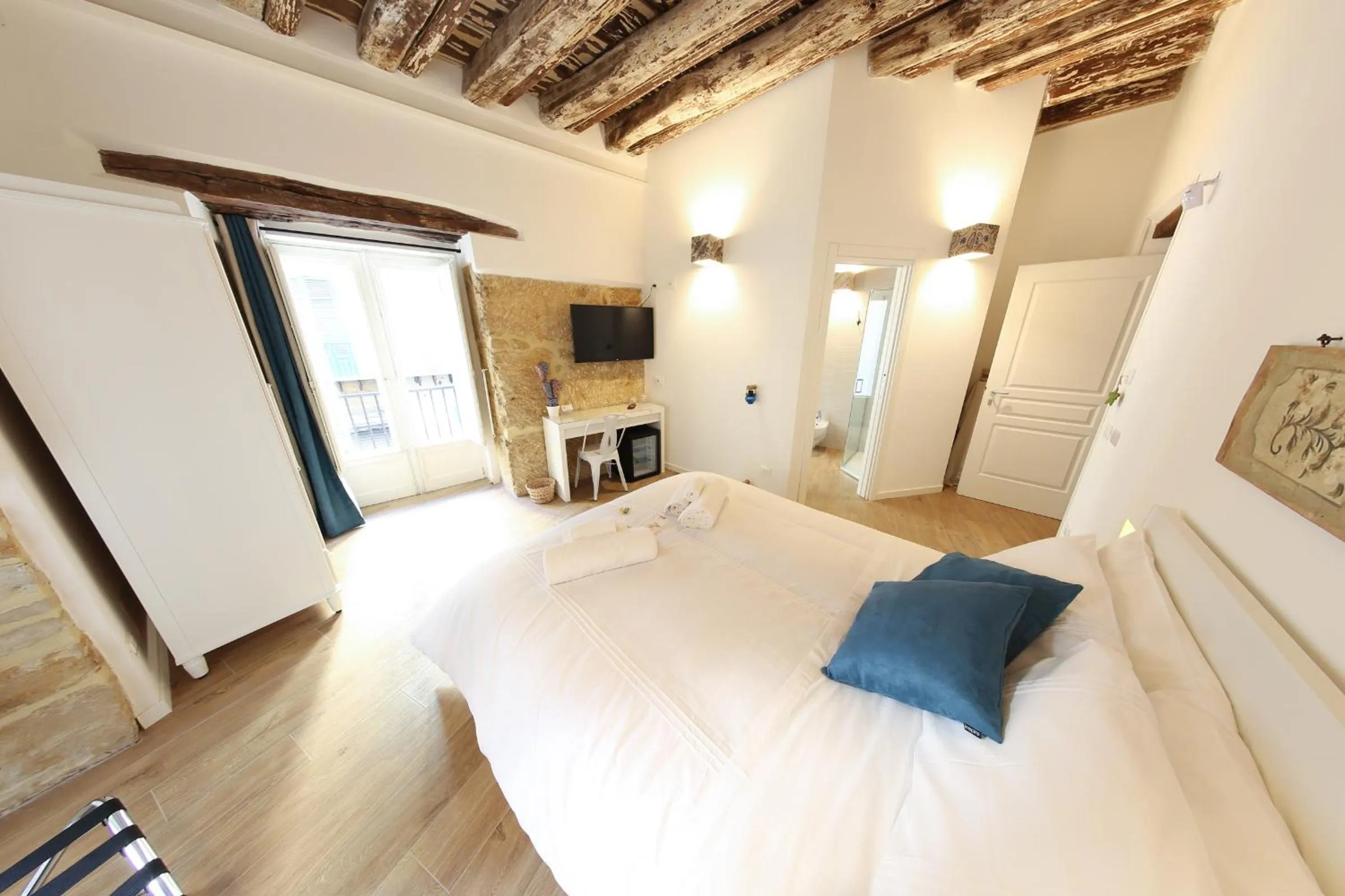 Bed in Bedda Mari Rooms & Suite