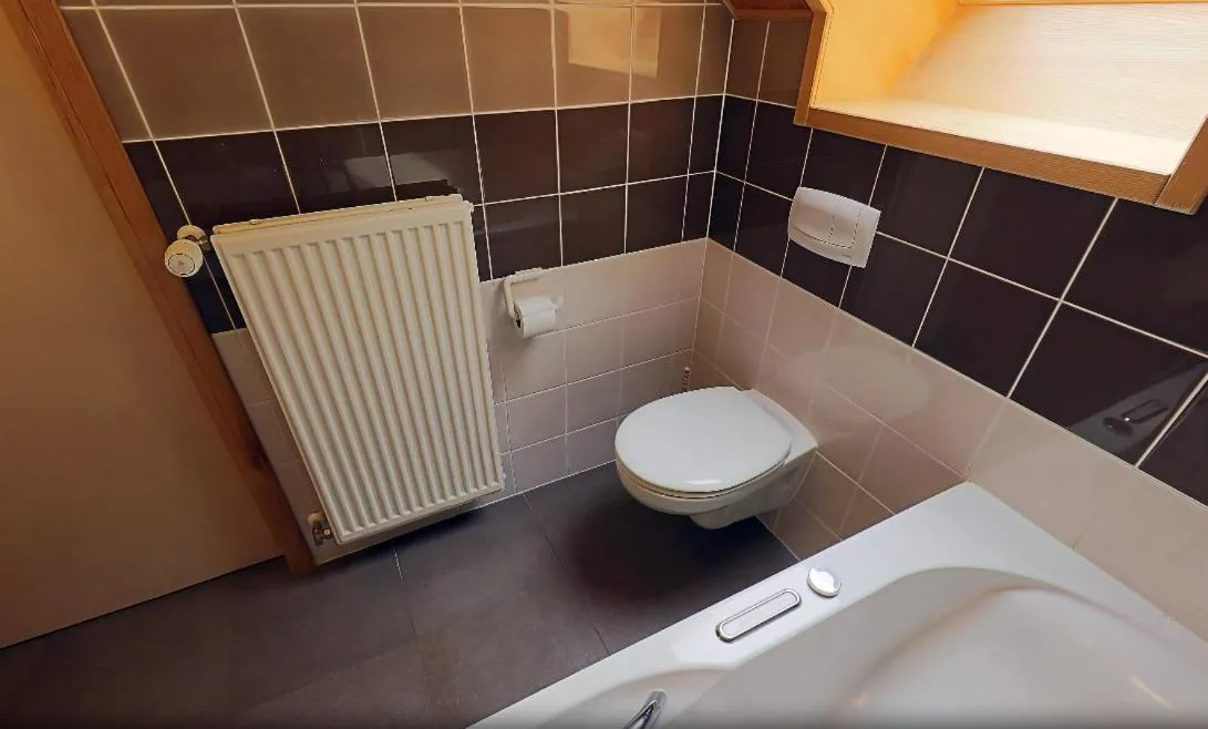 Bathroom in Familiehotel Soll Cress Koksijde