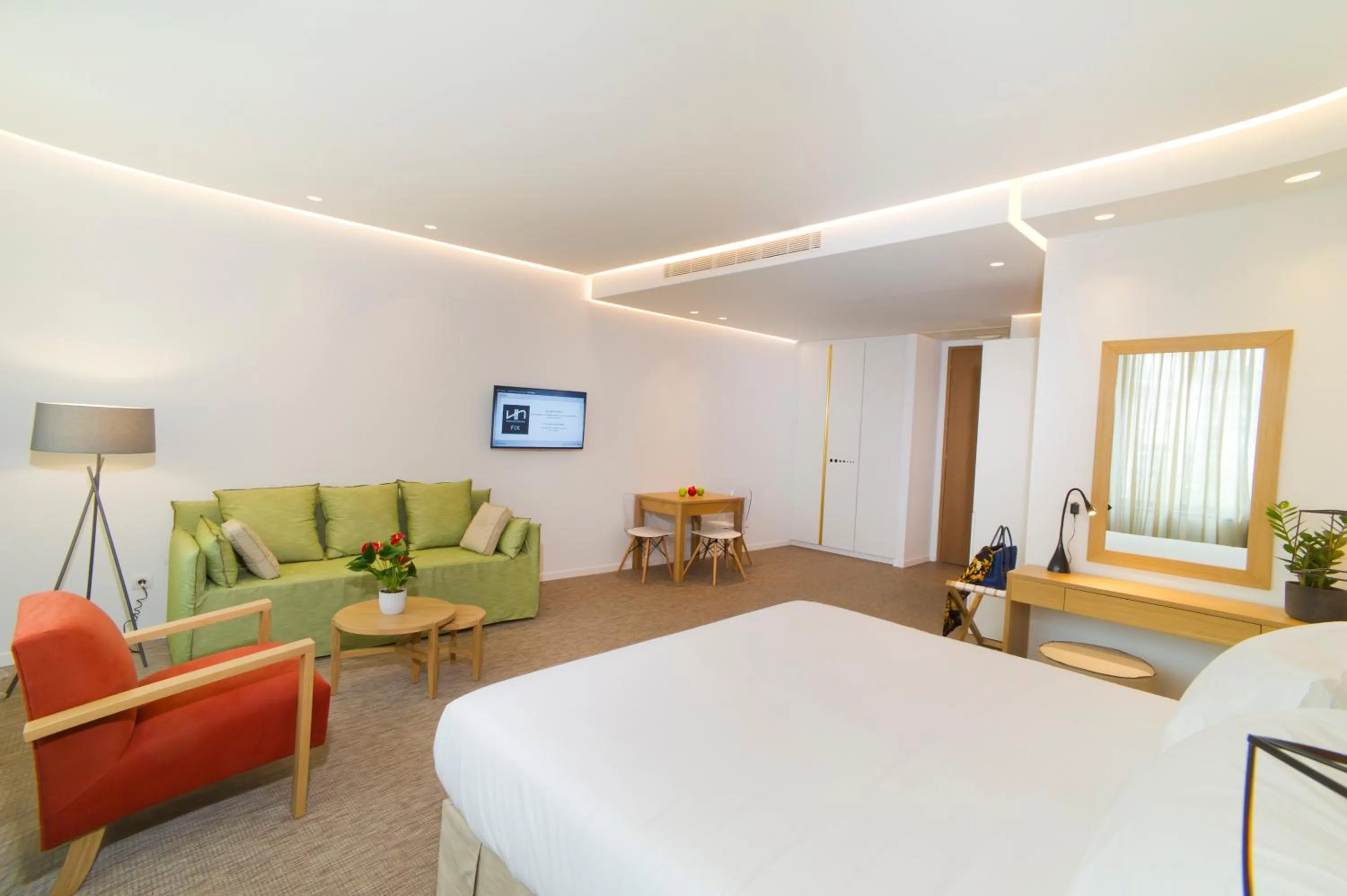 TV and multimedia, Bed in NLH FIX | Neighborhood Lifestyle Hotels