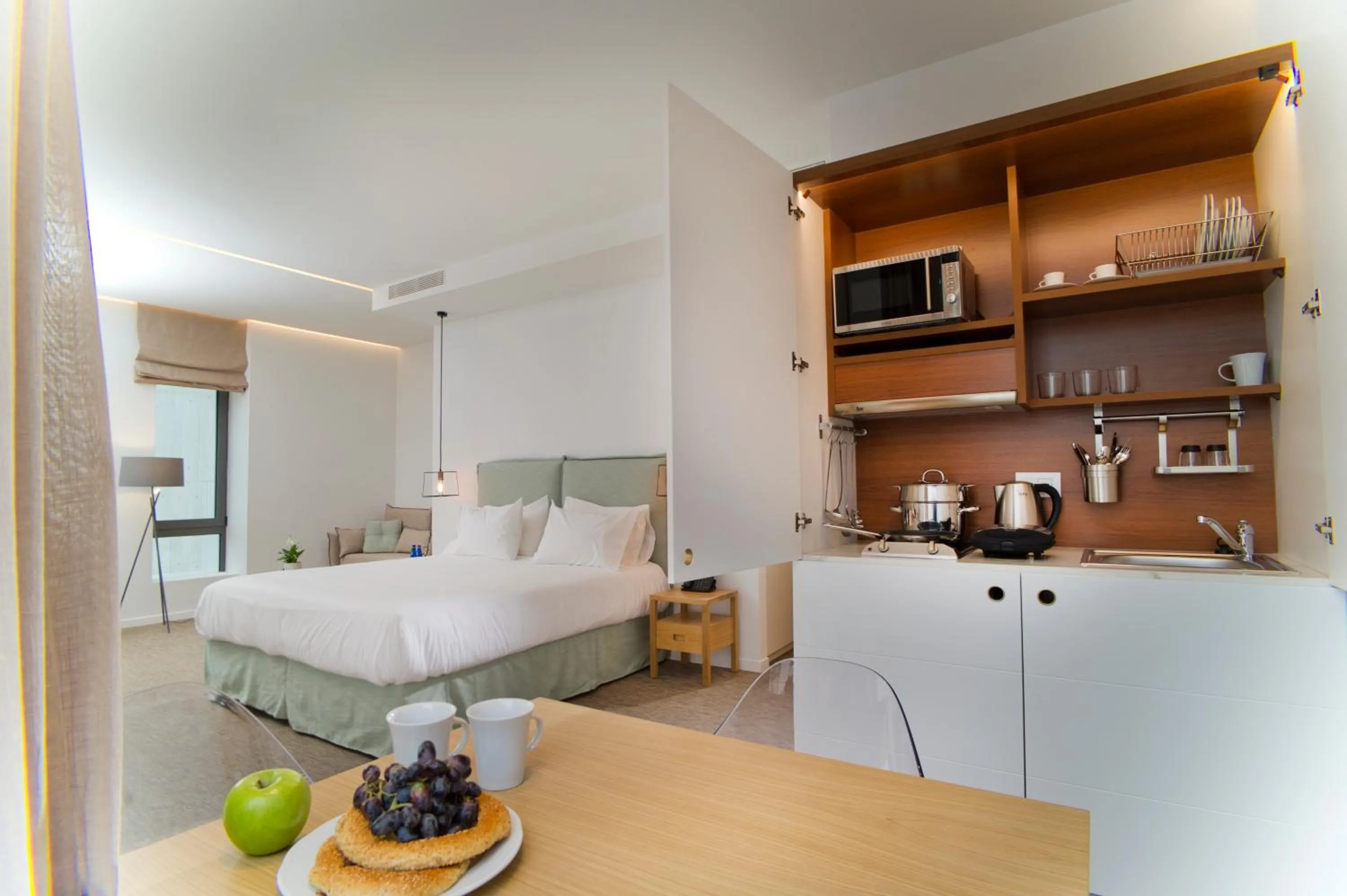 Kitchen or kitchenette, Bed in NLH FIX | Neighborhood Lifestyle Hotels