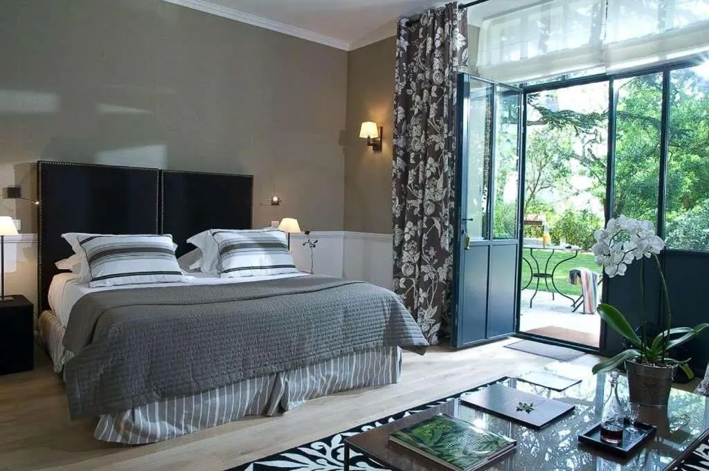 Photo of the whole room, Bed in Domaine de la Tortinière