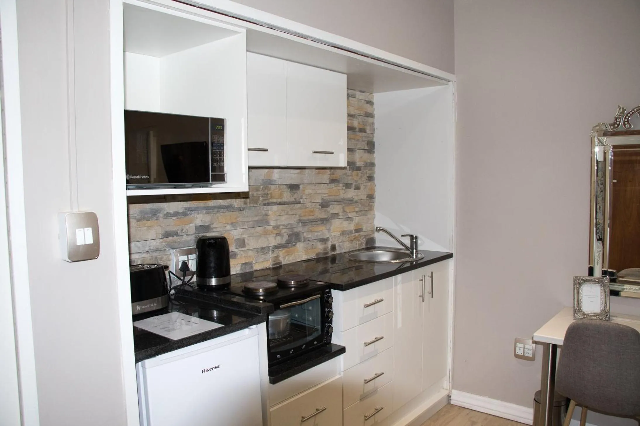 Kitchen or kitchenette in A' Queenslin Guesthouse