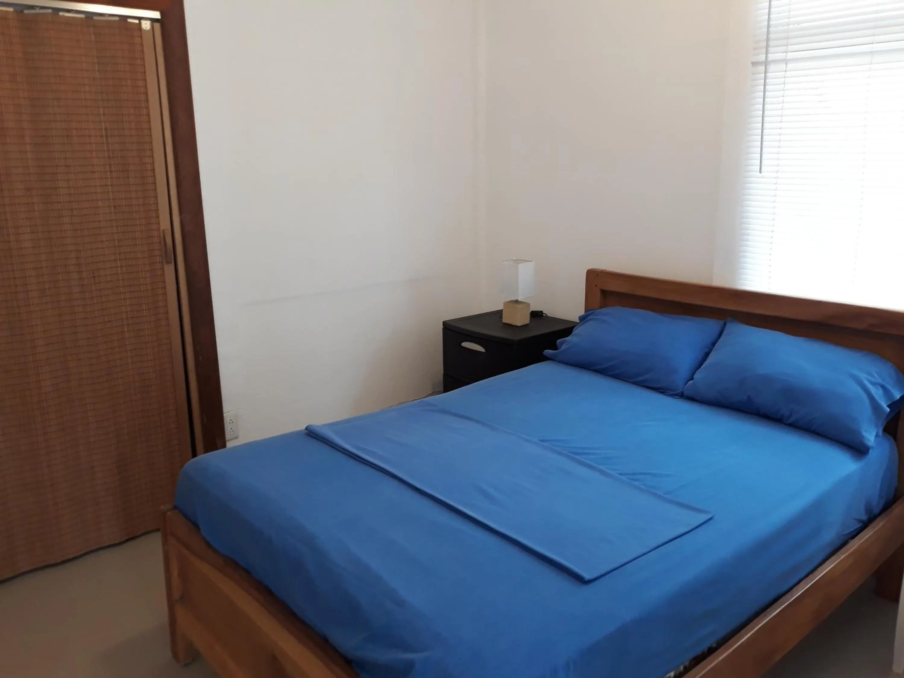 Bed in Hotel Almond Beach