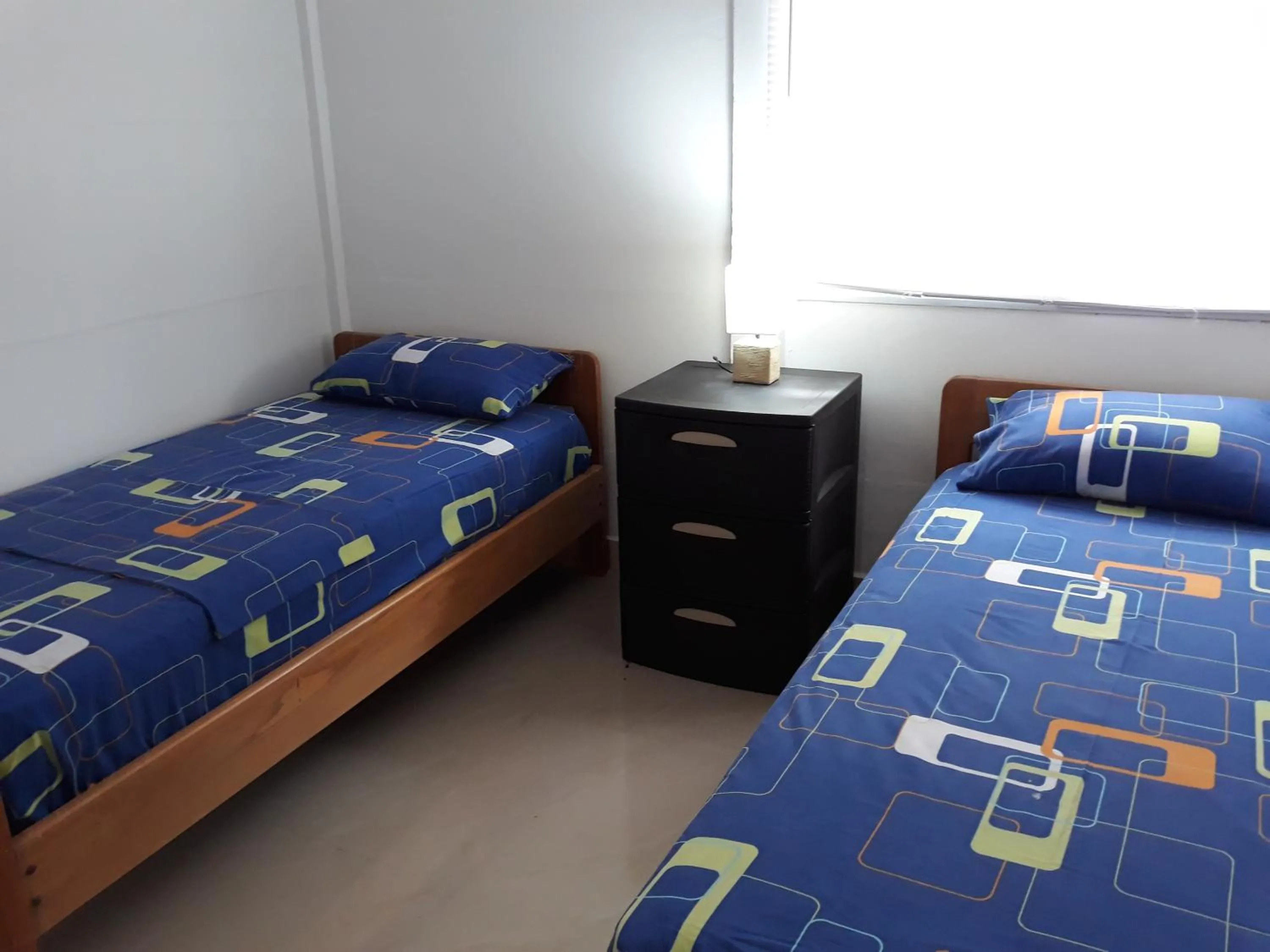 Bed in Hotel Almond Beach