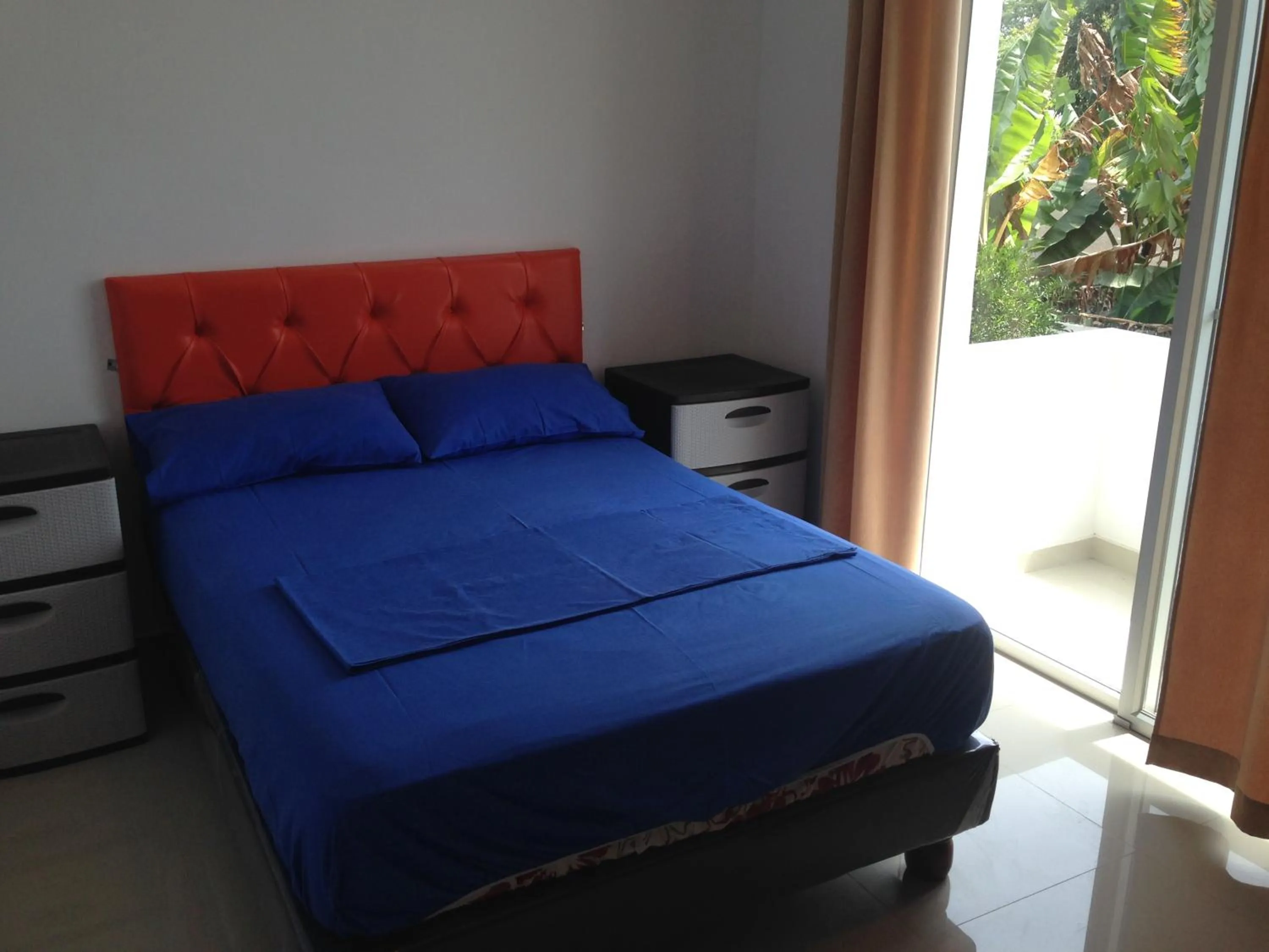 Bed in Hotel Almond Beach