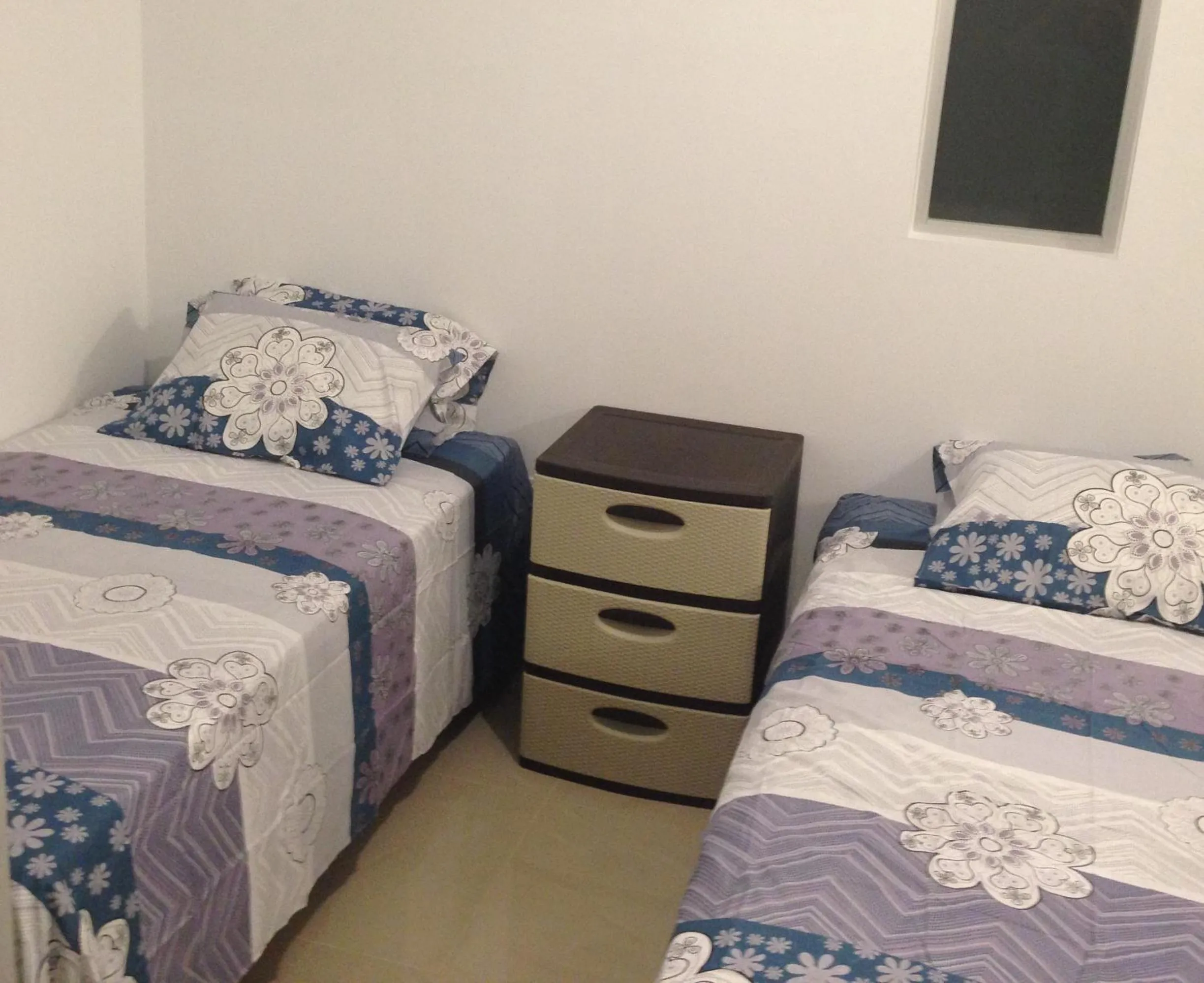 Bed in Hotel Almond Beach