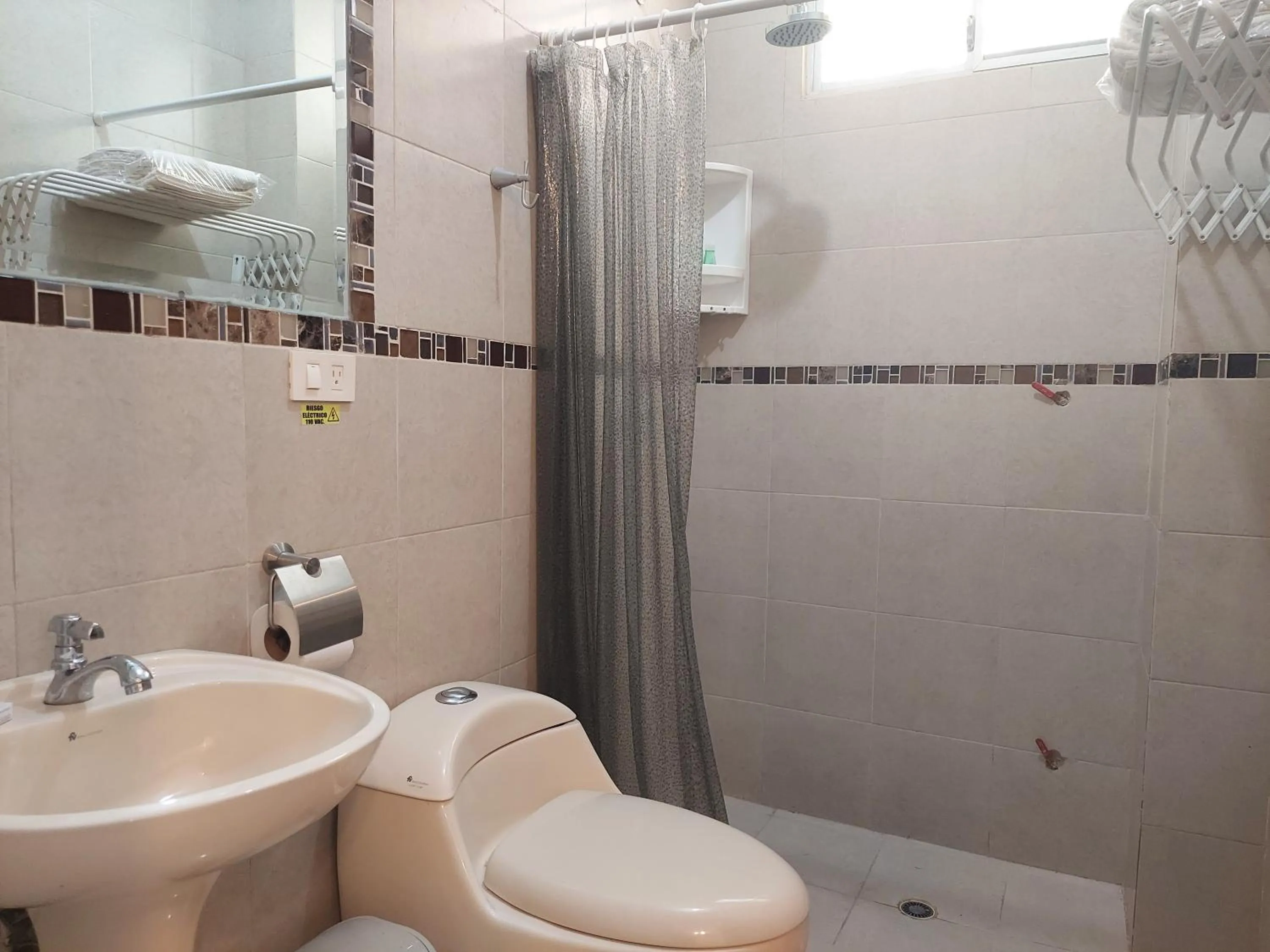 Bathroom in Hotel Almond Beach