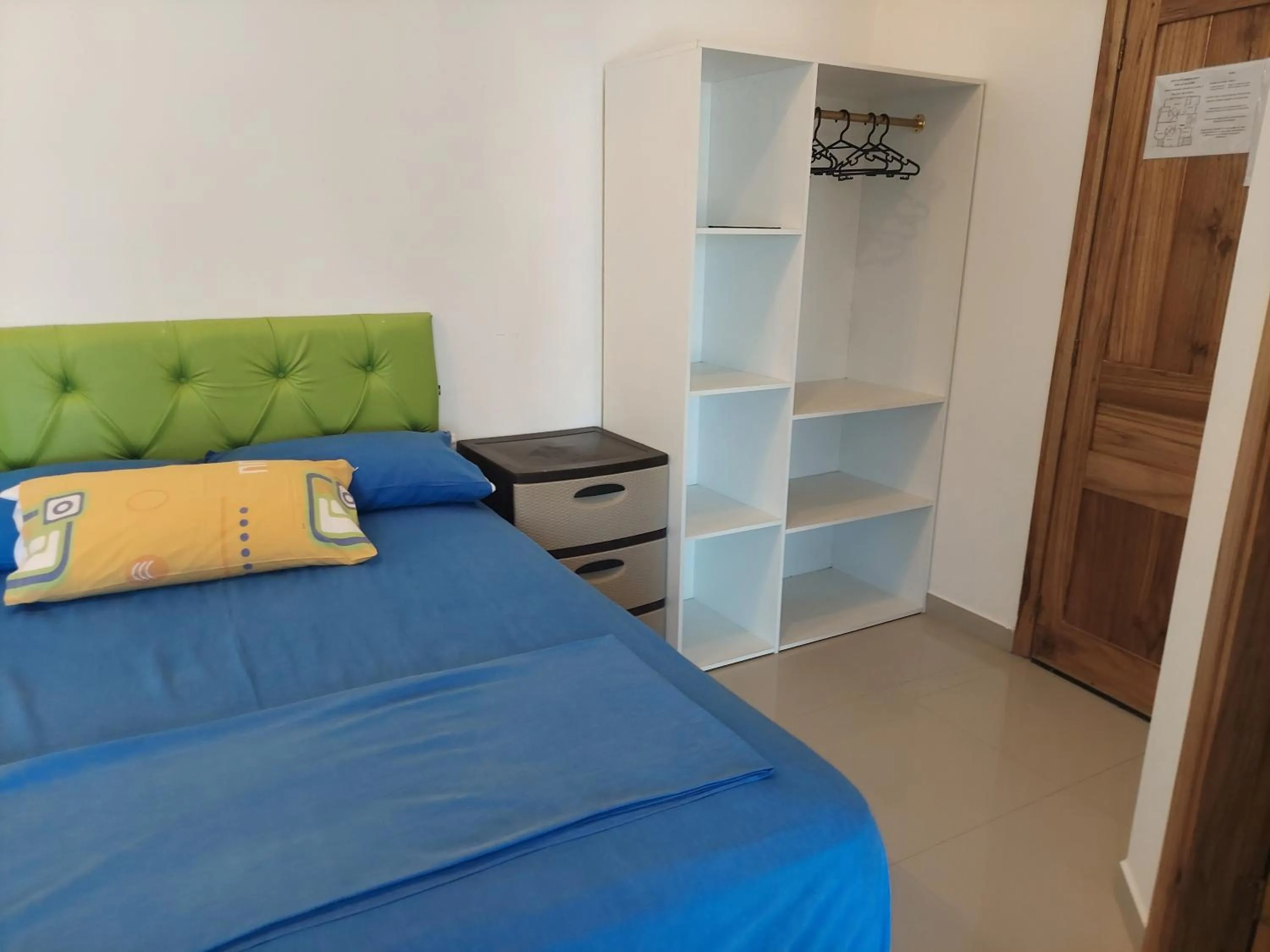 Bed in Hotel Almond Beach