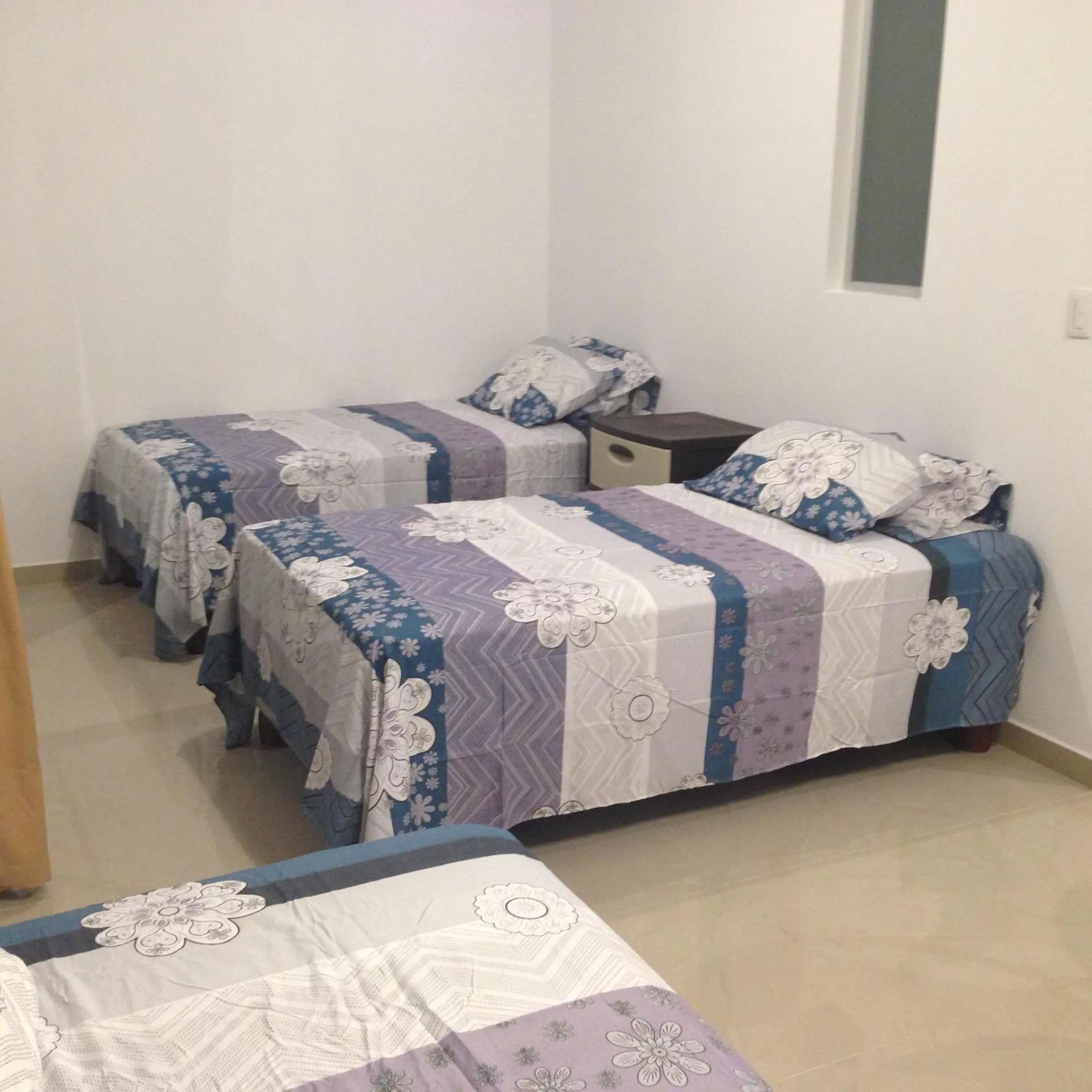 Bed in Hotel Almond Beach