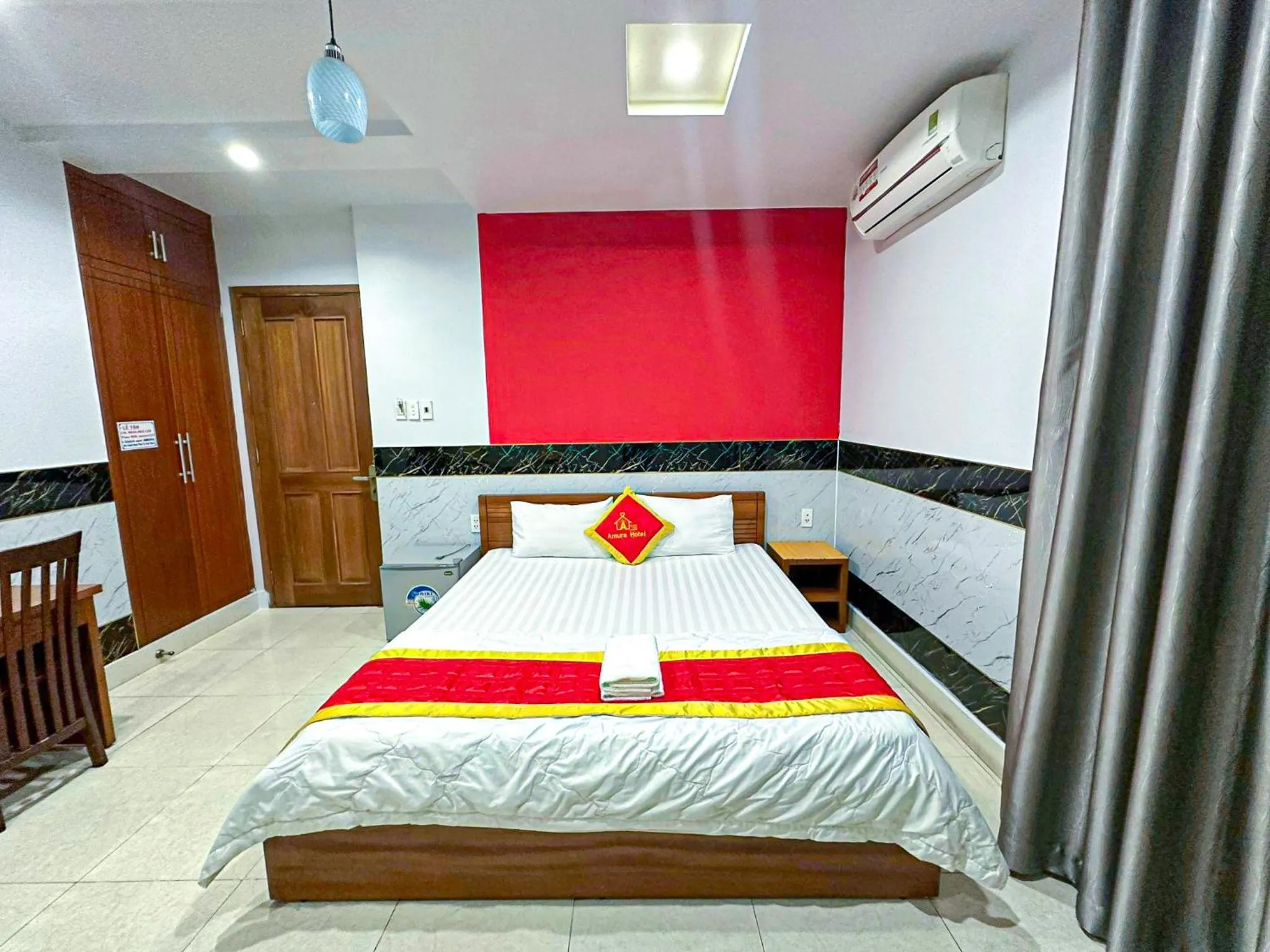 Bed in Amura Hotel Quận 7