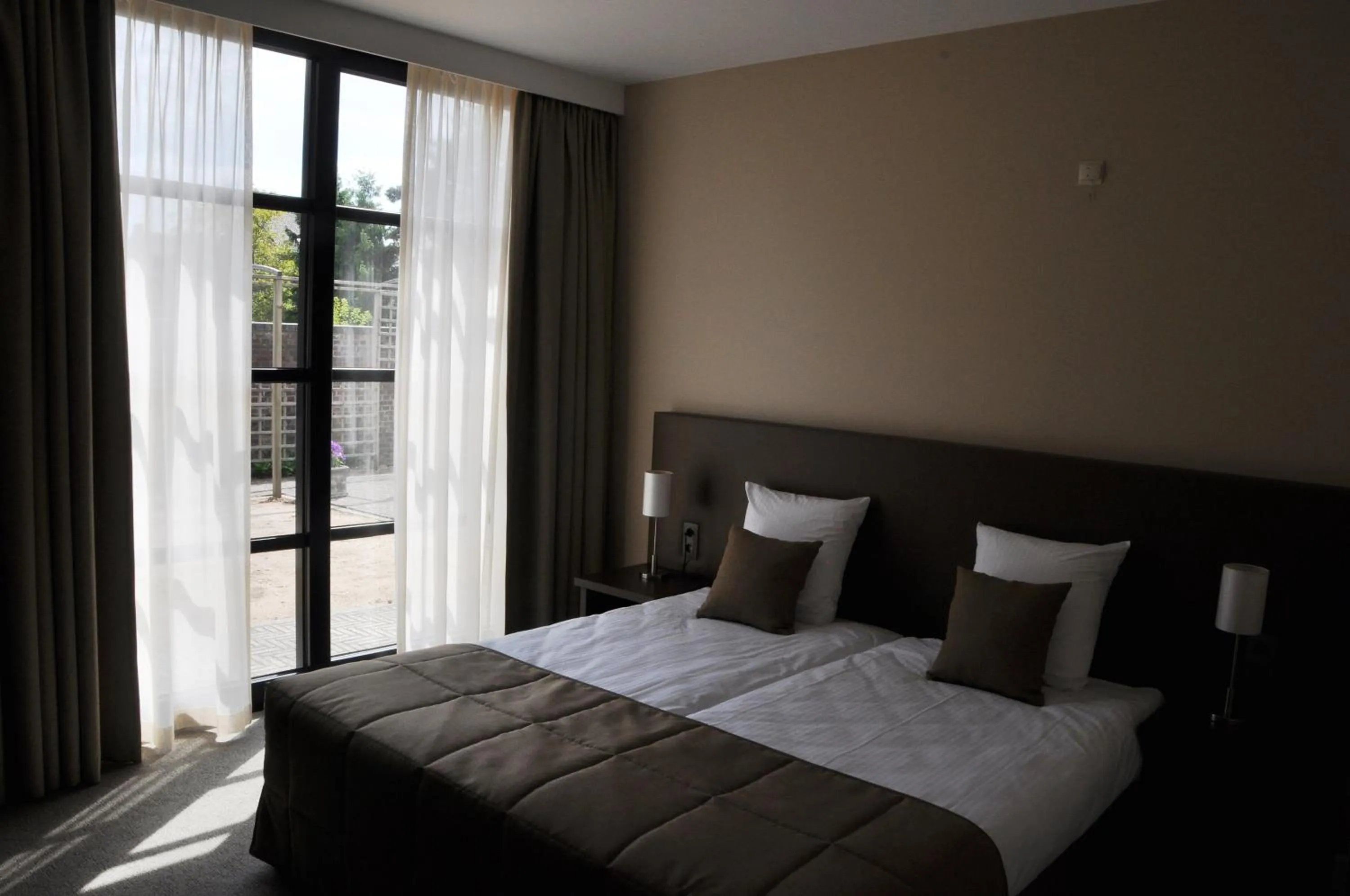 Bed in Hotel Boomgaard